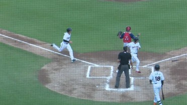 Ring clears bases with double