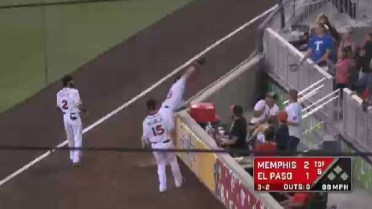 Chihuahua's Allday leans over railing to make catch