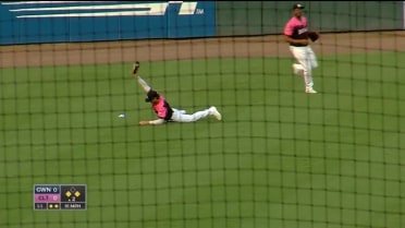 Luis González lays out for a spectacular grab