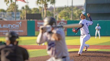 Tremendous Trio Twirl Three-Hitter in 2-0 Triumph