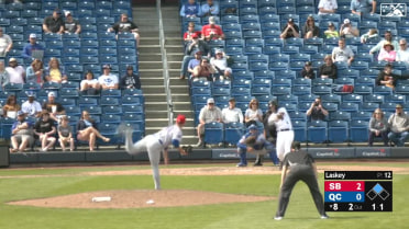 Cayden Wallace scoops an RBI single for Quad Cities