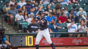 Hooks Plate Five in Ninth, Riders Hold for Win