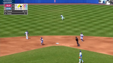 Drew Gilbert throws out a runner at home