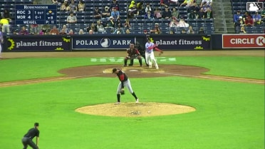 Patrick Weigel snags a comebacker between his legs