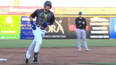 Gavin Cross belts a home run out of the ballpark