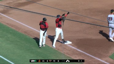 Kelvin Hidalgo lines a triple to right-center field