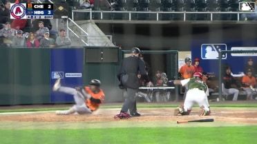 Enrique Bradfield Jr. reaches home on a grounder