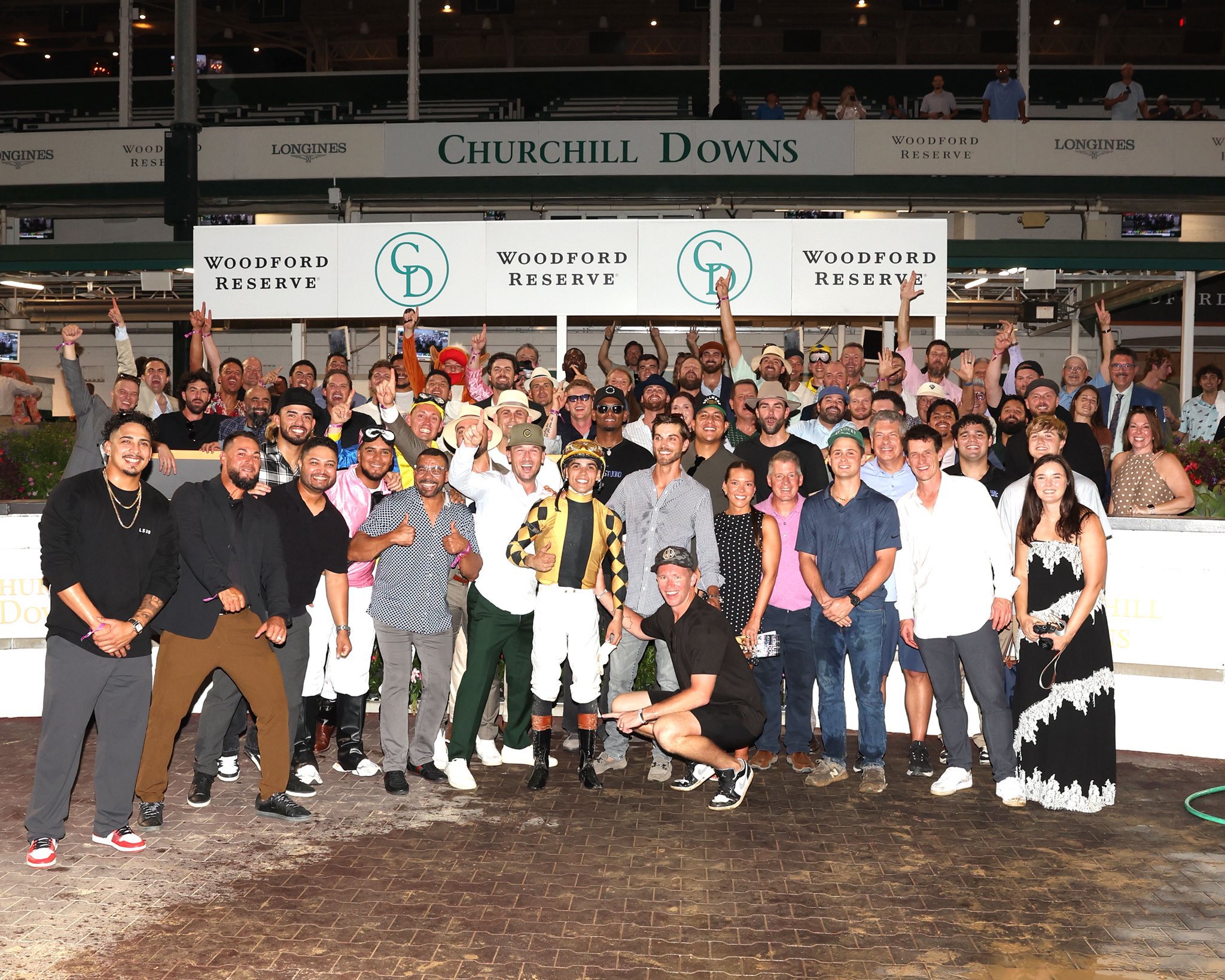 The Cubs in the winner's circle at Churchill Downs