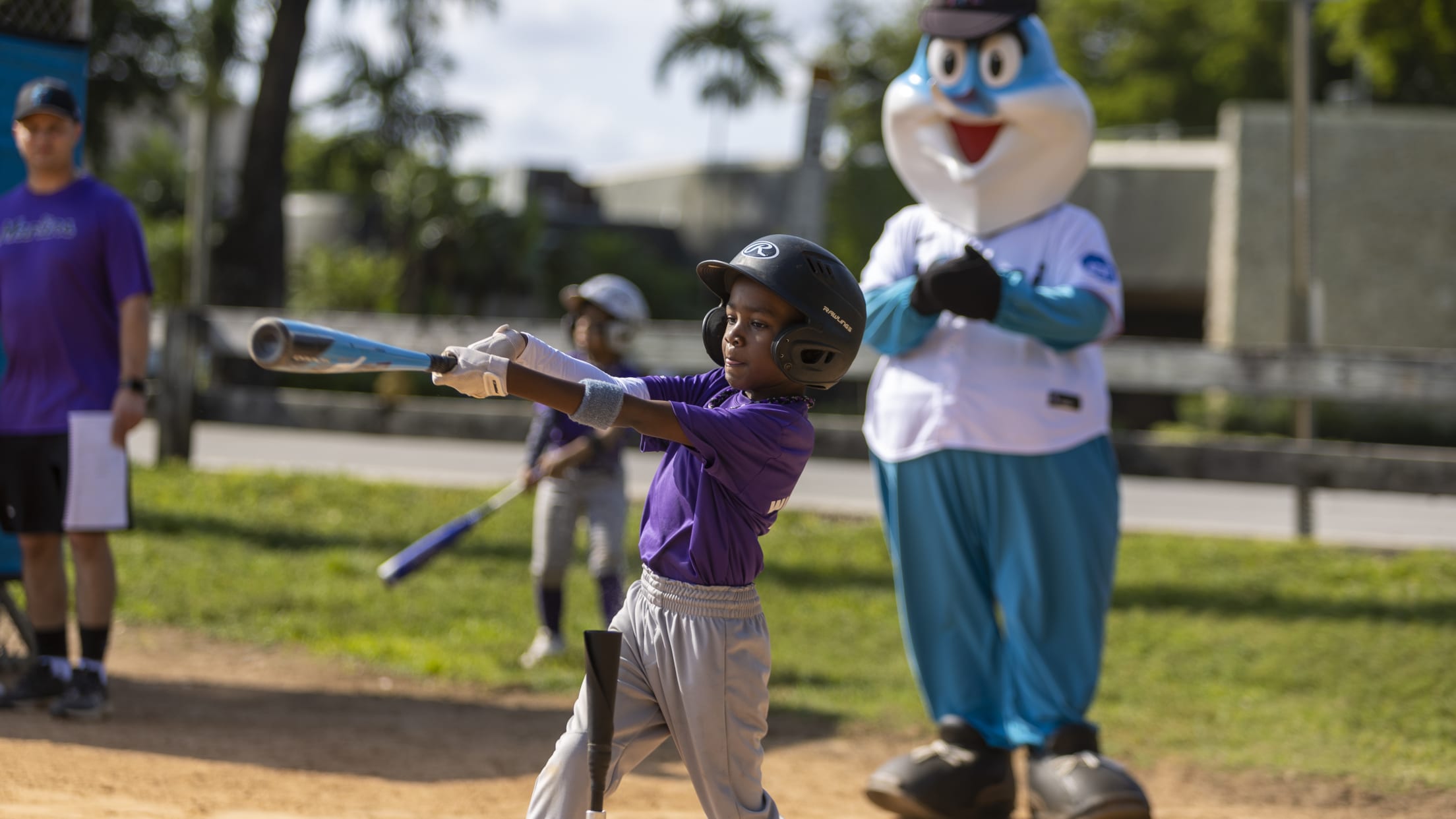 Marlins youth tee ball player