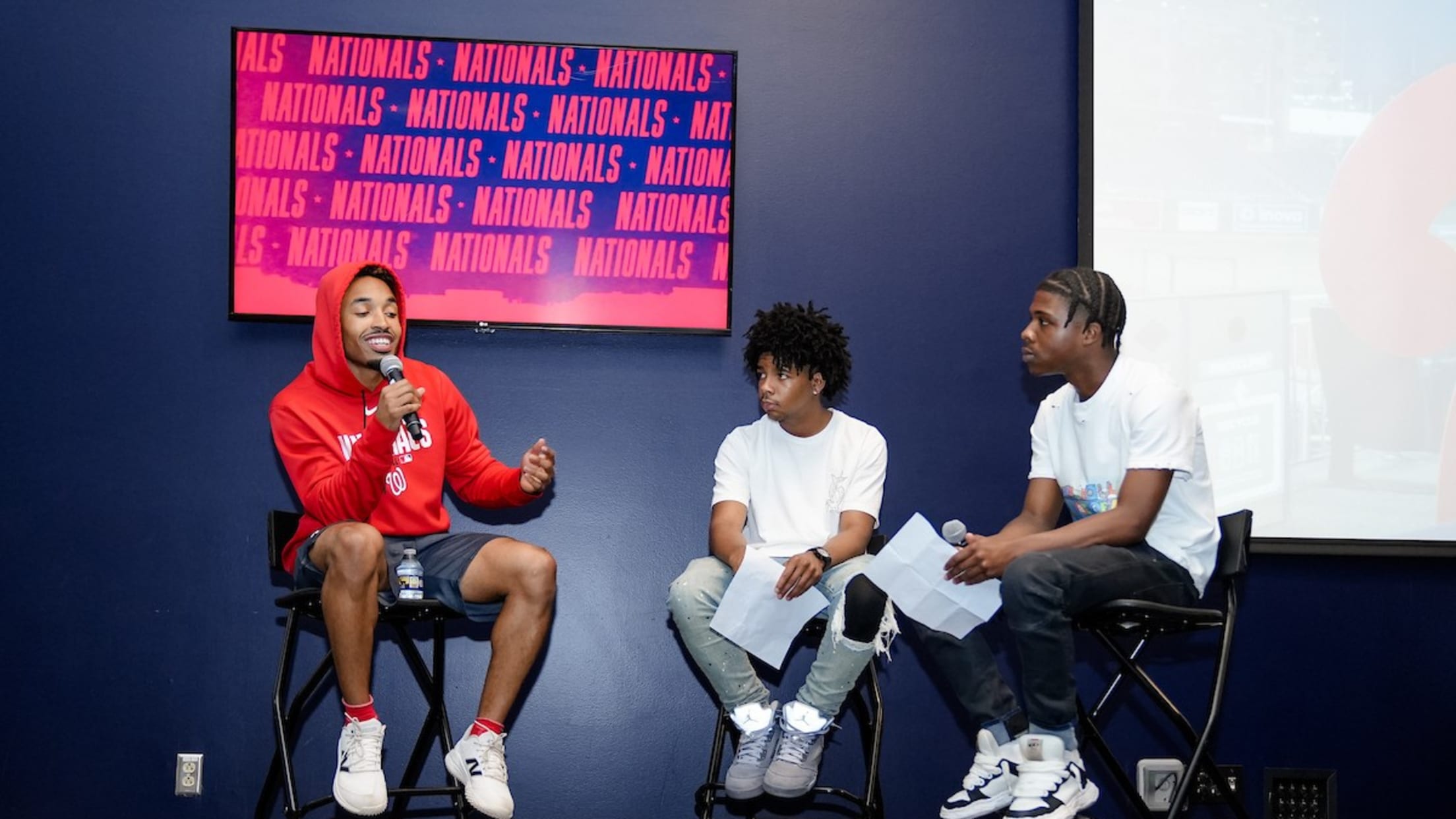 Nasim Nuñez speaks on a panel with young adults from the District of Columbia Interscholastic Athletic Association (DCIAA).
