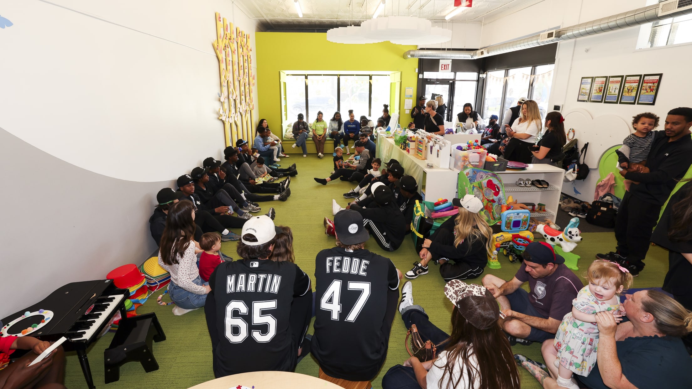 Davis Martin and Erick Fedde join kids at an event in Chicago.