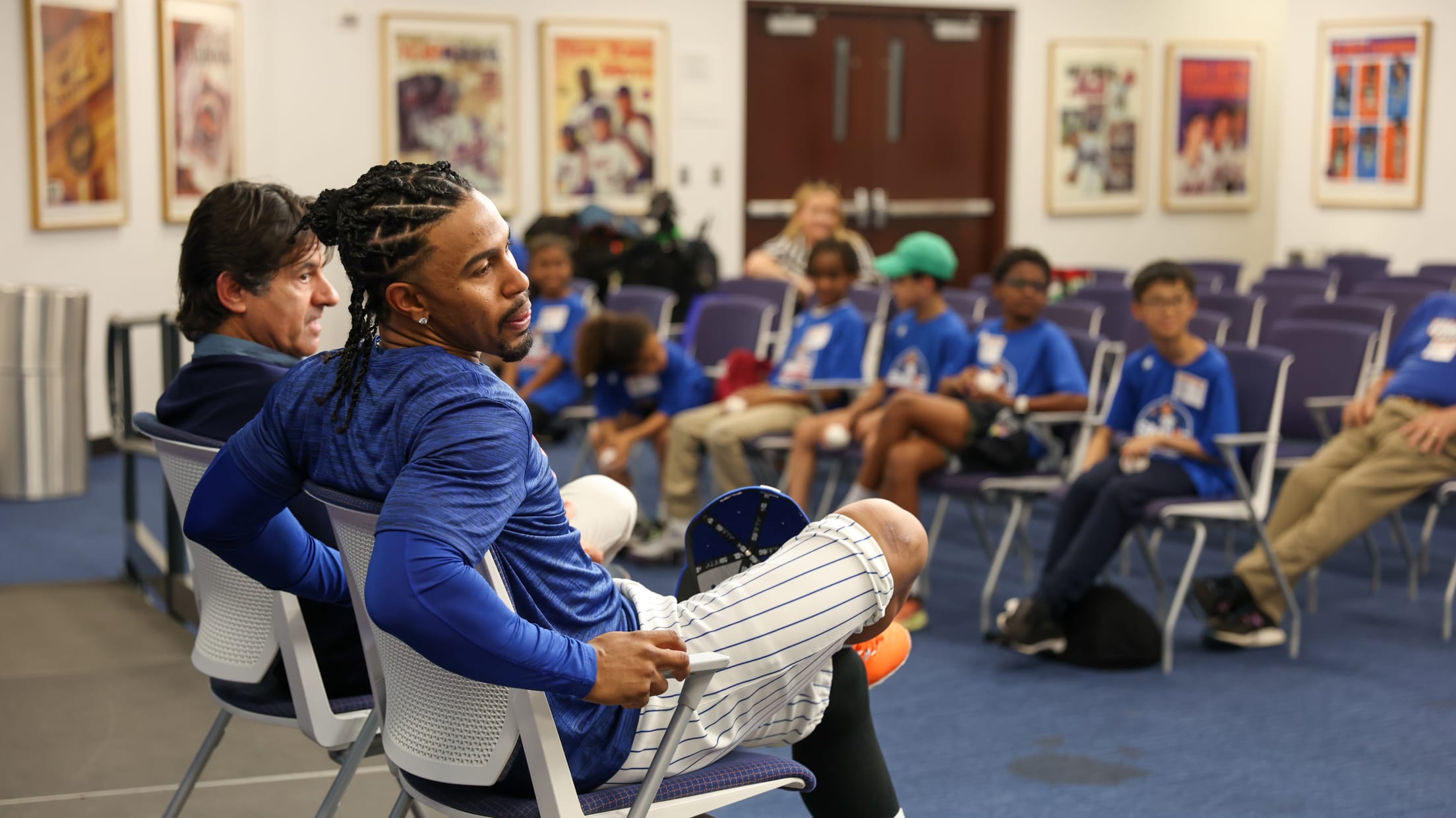 Francisco Lindor speaks to kids at the Citi Field press conference room.