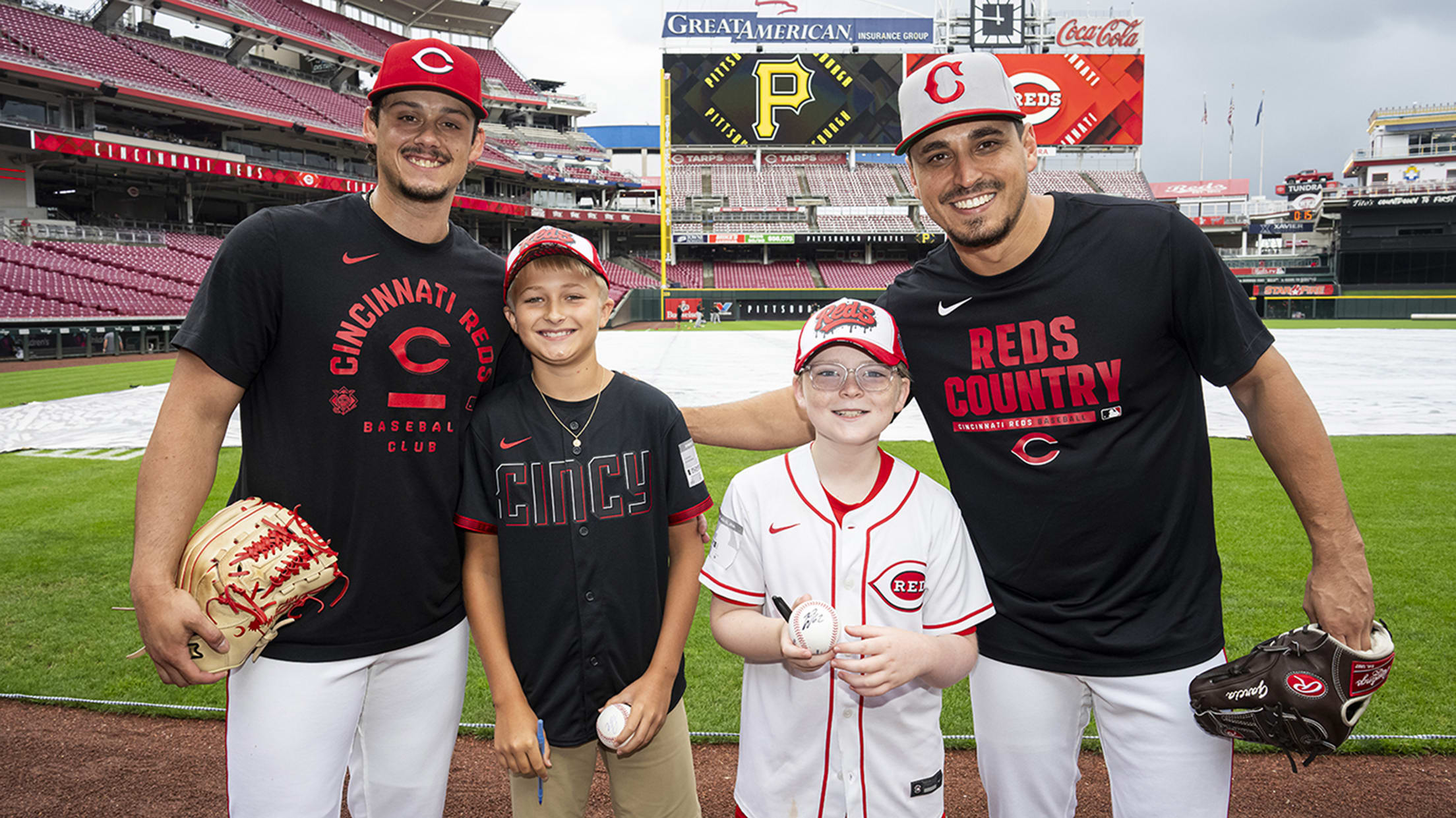 Zach McCambley and Julian Garcia pose with Connor Hyitt and his friend.