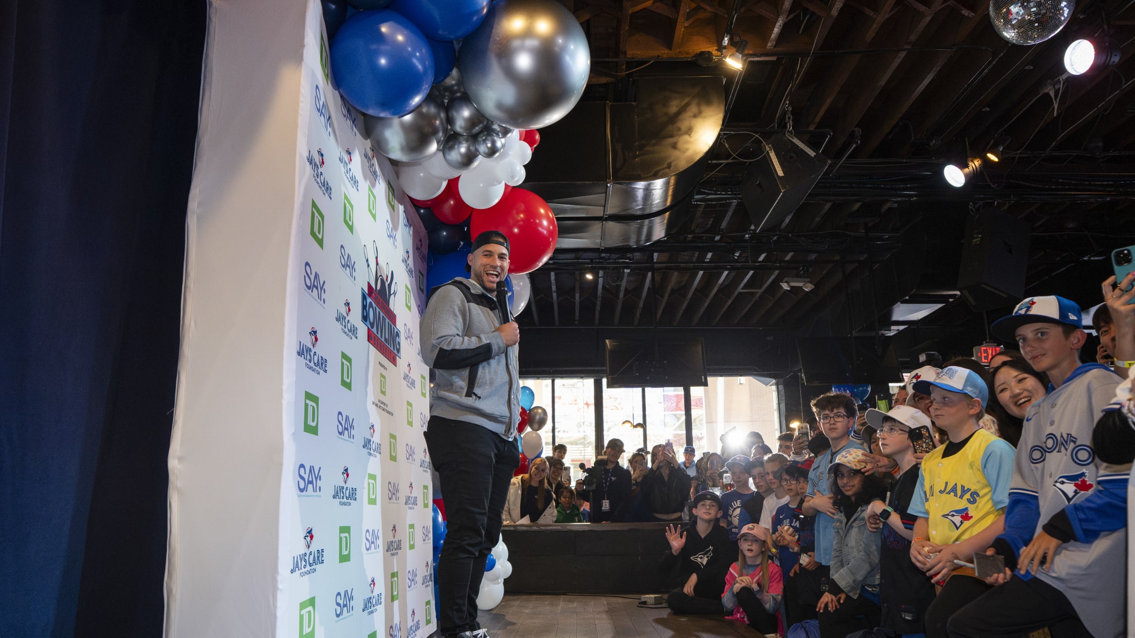 George Springer and Toronto Blue Jays fans at a bowling event.