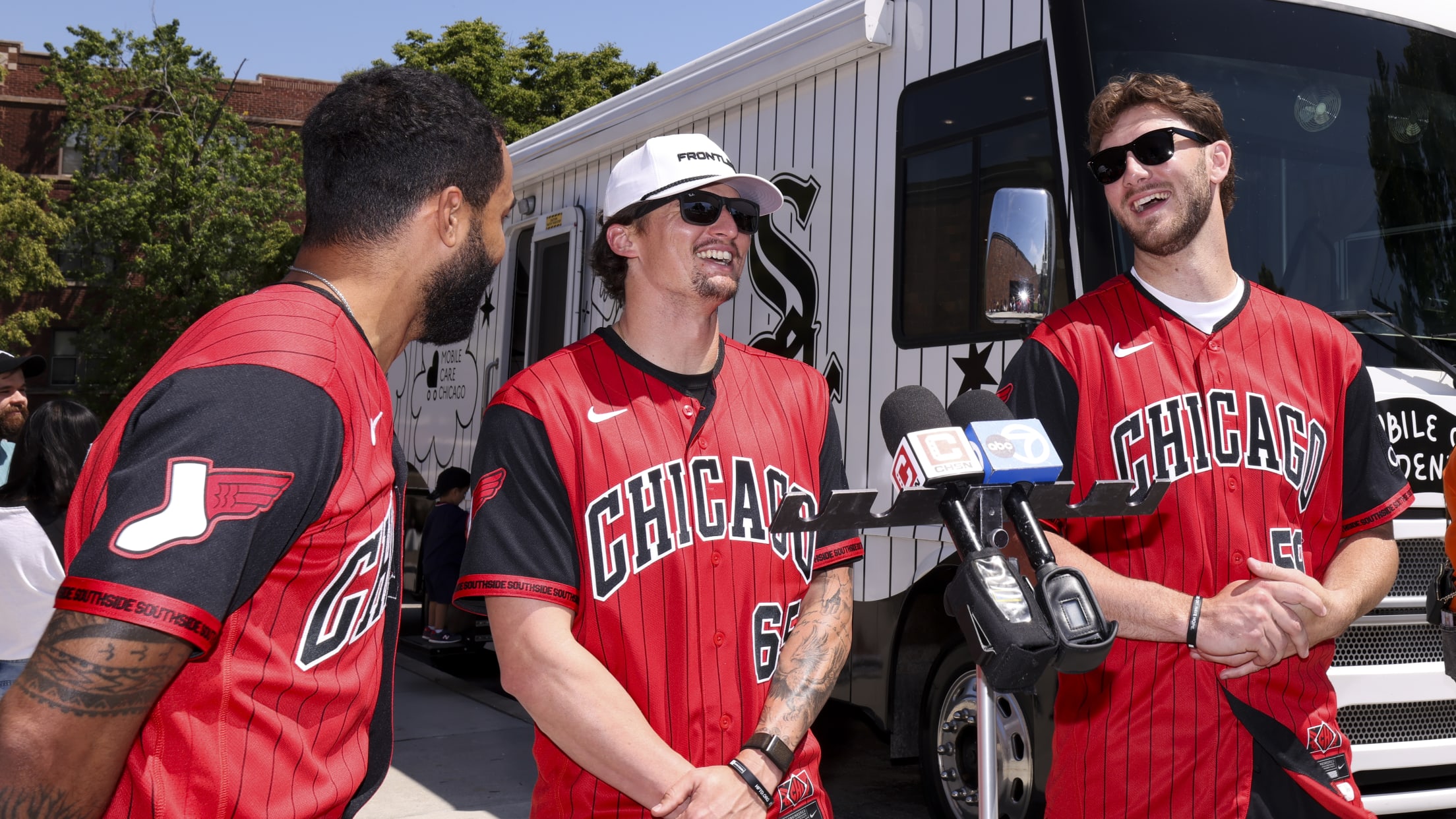 Davis Martin is joined by teammates as they take part in a mobile care dental clinic in Chicago.