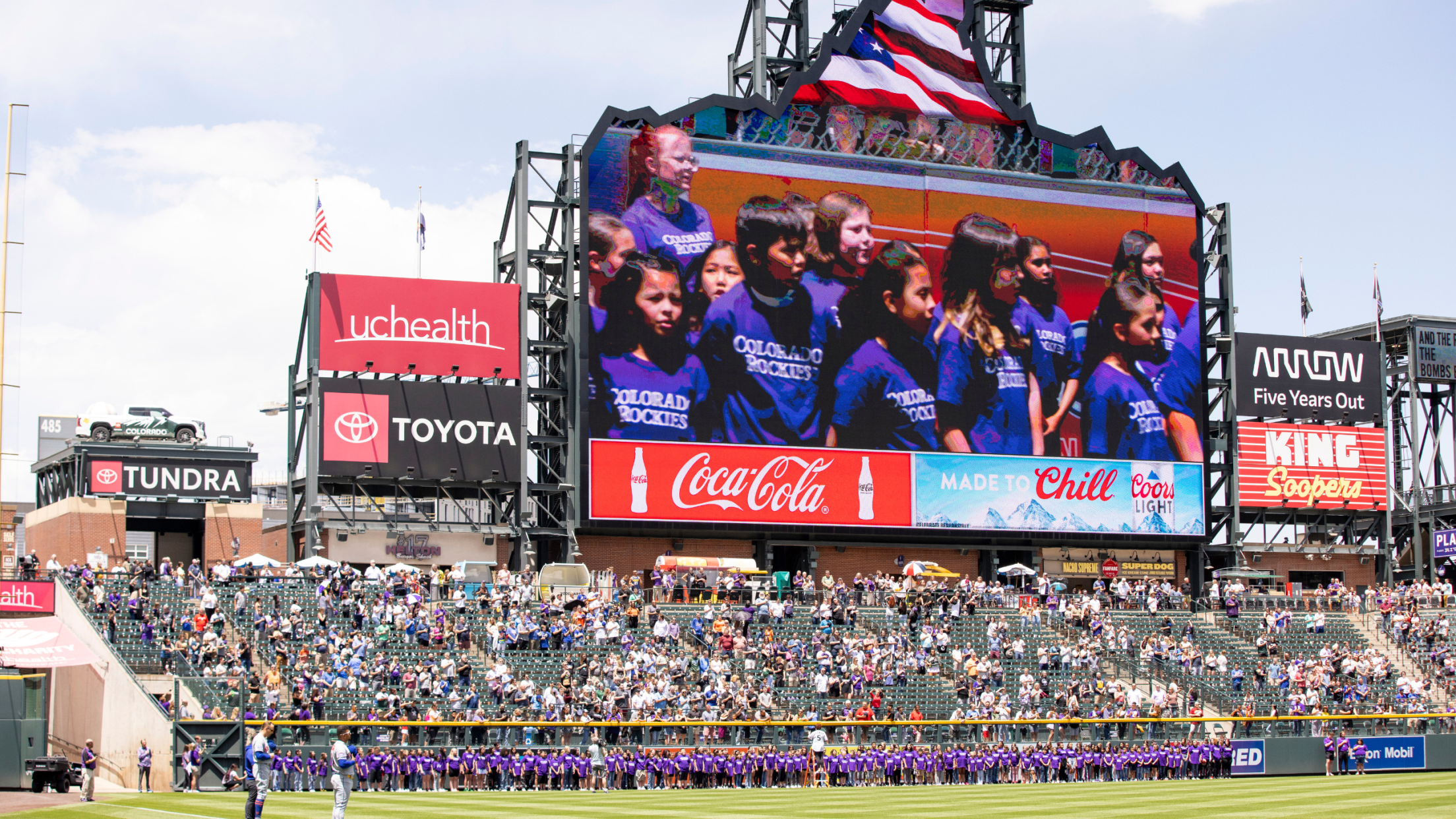 Purchase tickets to watch your group perform the National Anthem live at Coors Field
