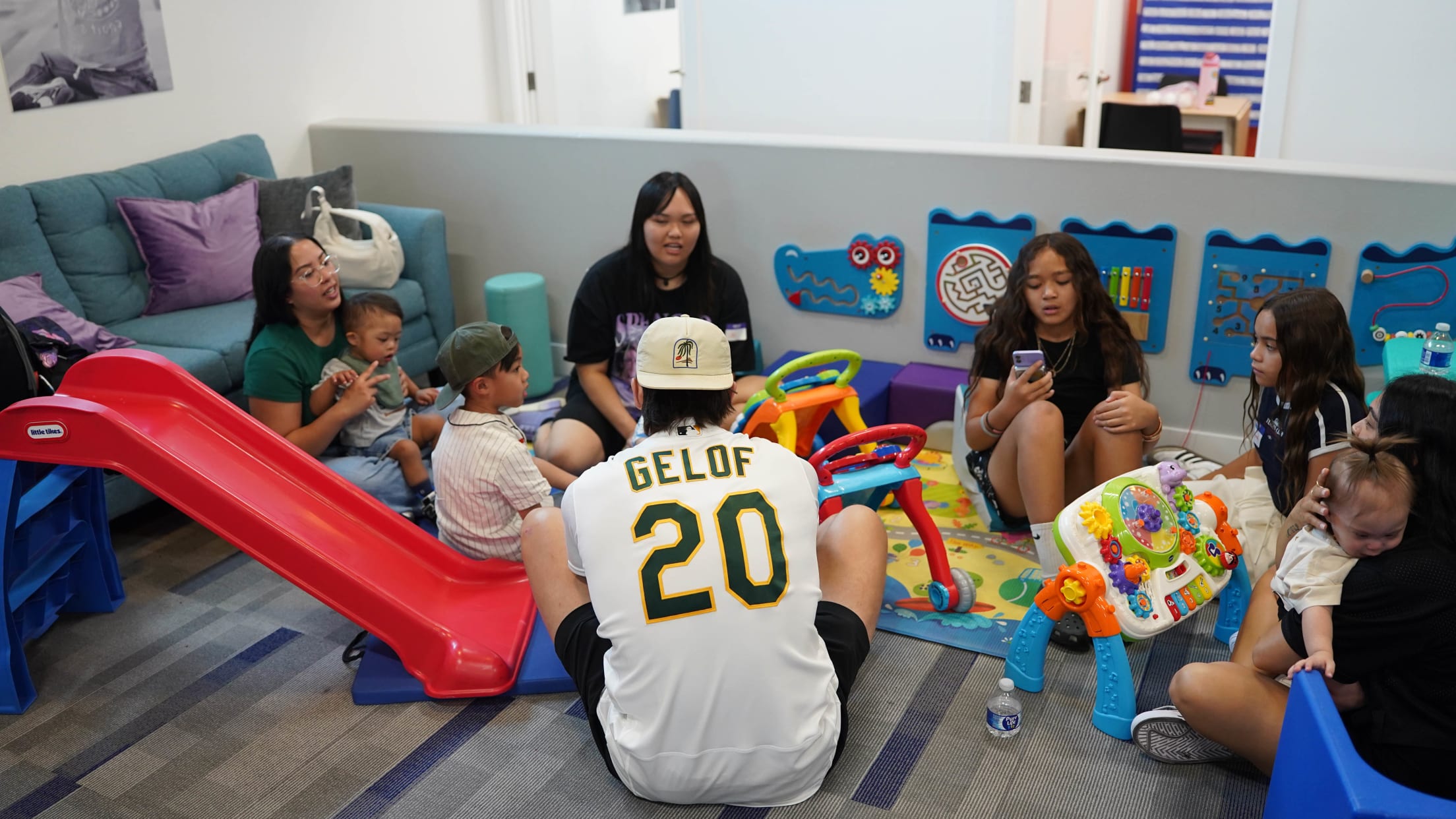 Zack Gelof plays with kids and parents at GiGi's Playhouse.