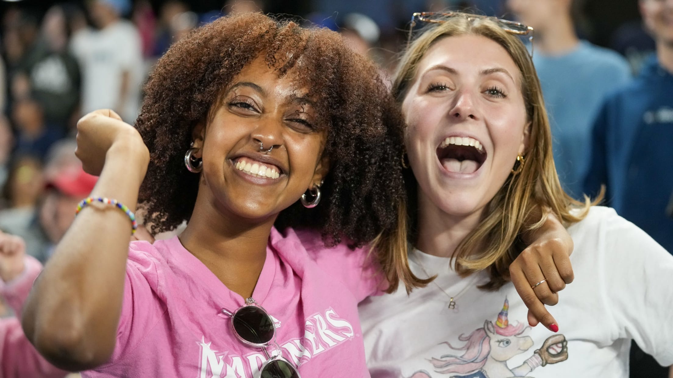 Two Mariners Fans Cheering