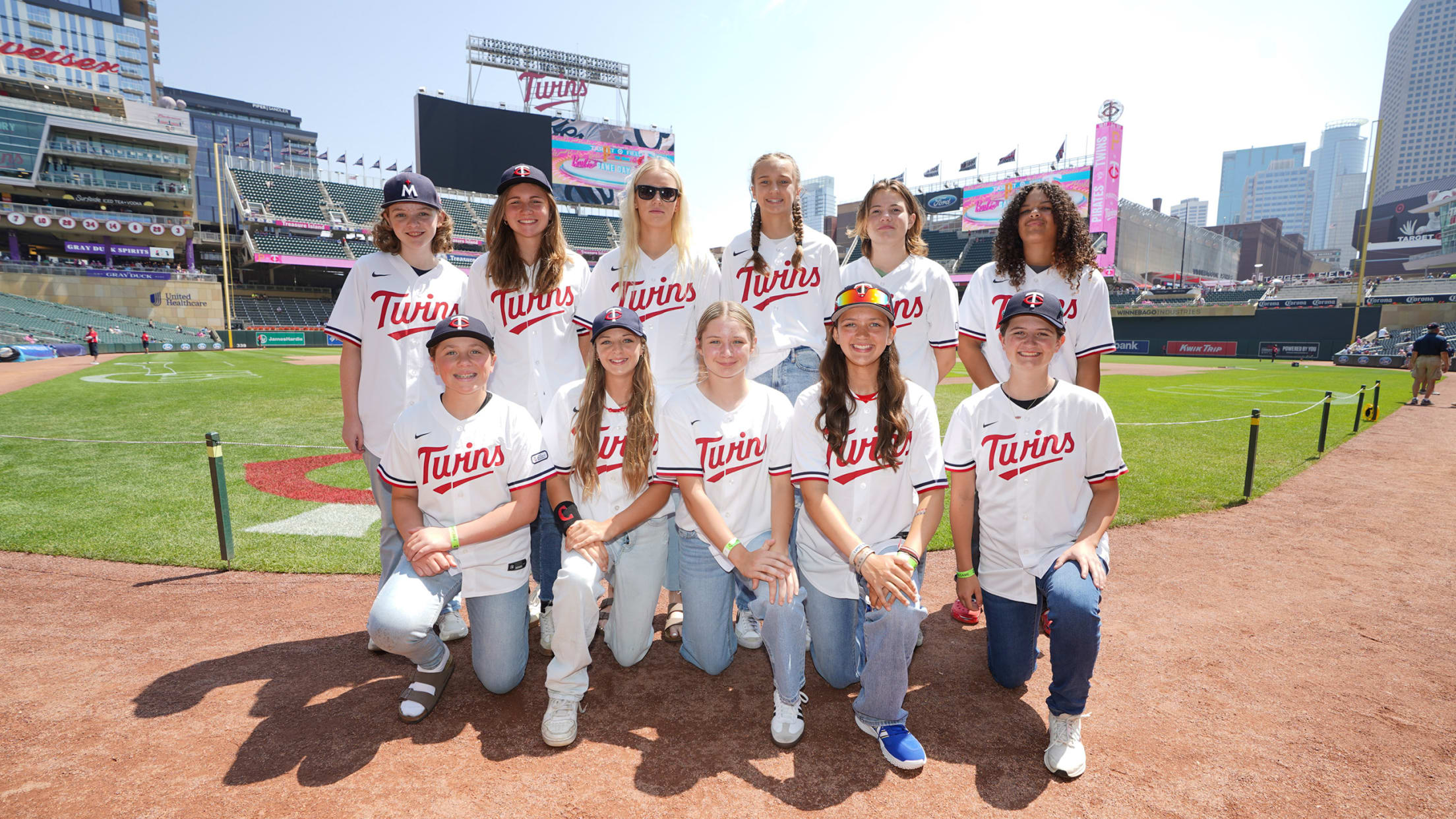 2025 14U team at Target Field wearing Twins jerseys