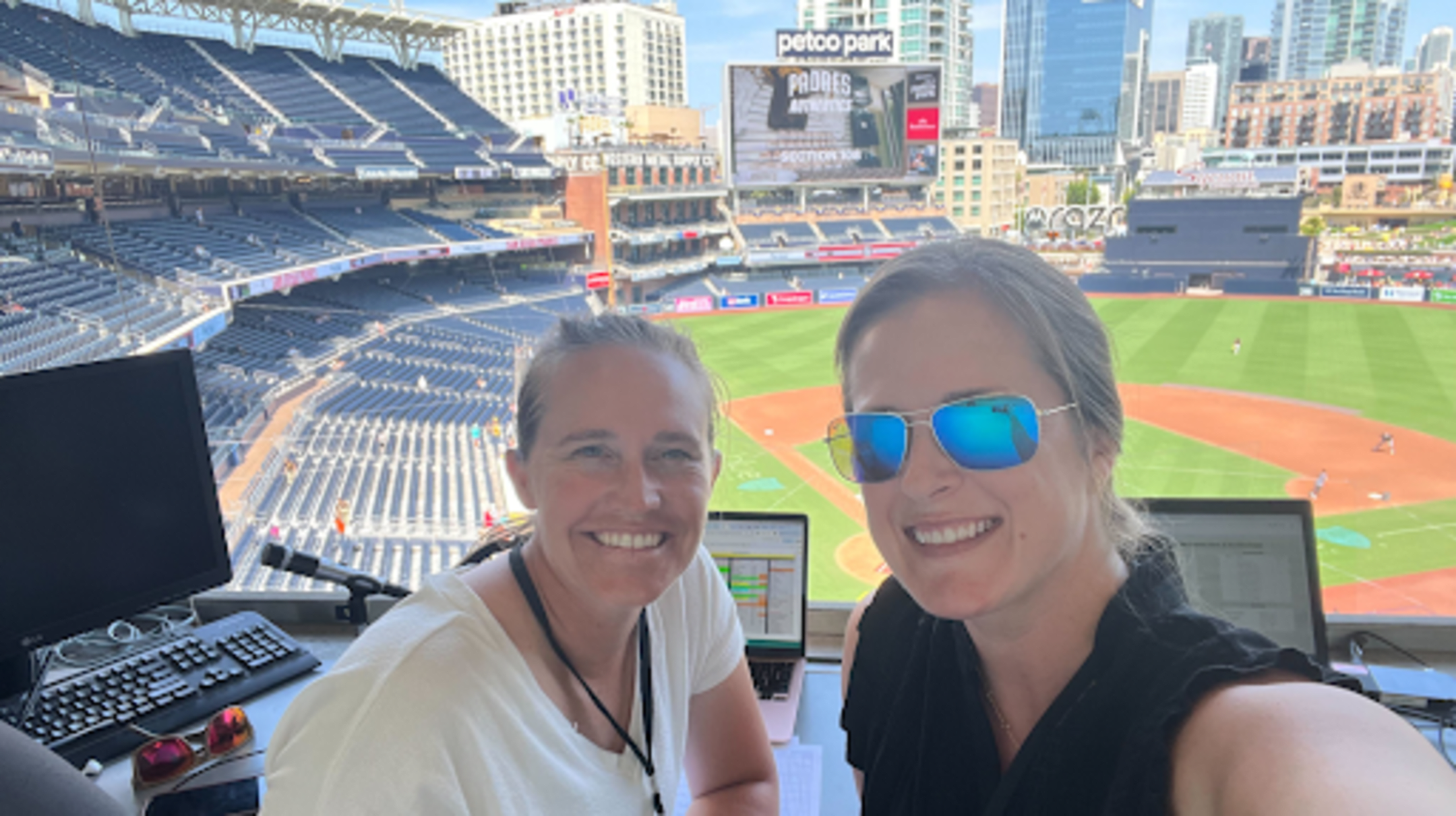 Two women who work in data operations at Major League Baseball.
