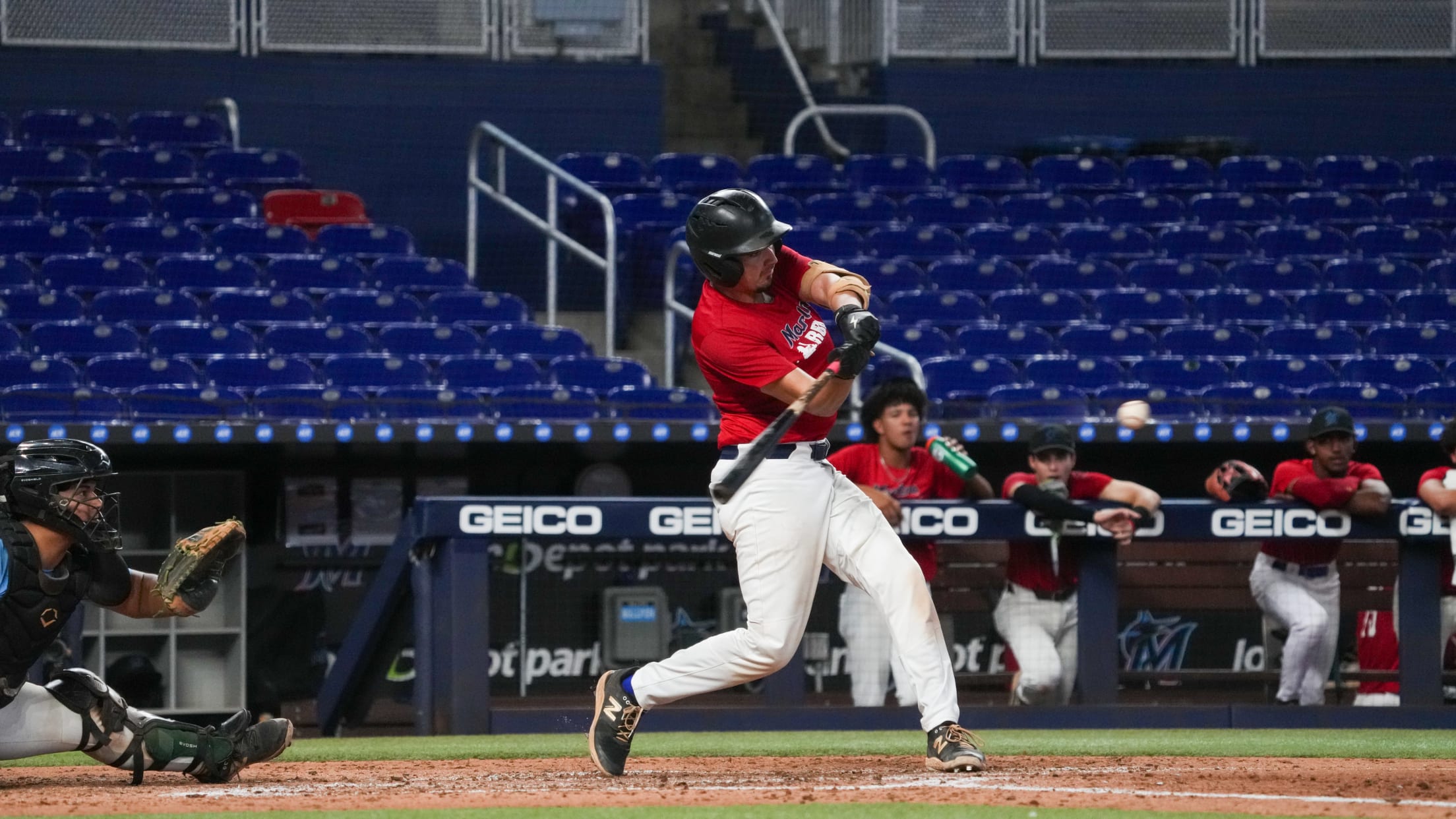 A player swings at a pitch at the Wood Bat Classic.
