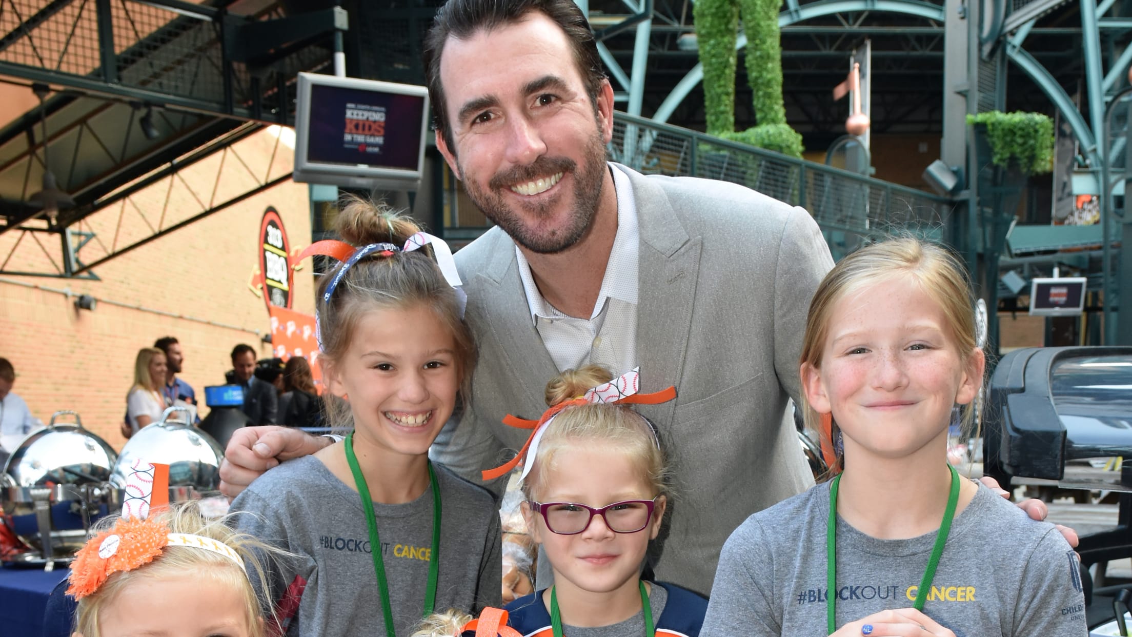 Justin Verlander takes a picture with a group of young Detroit Tigers fans.