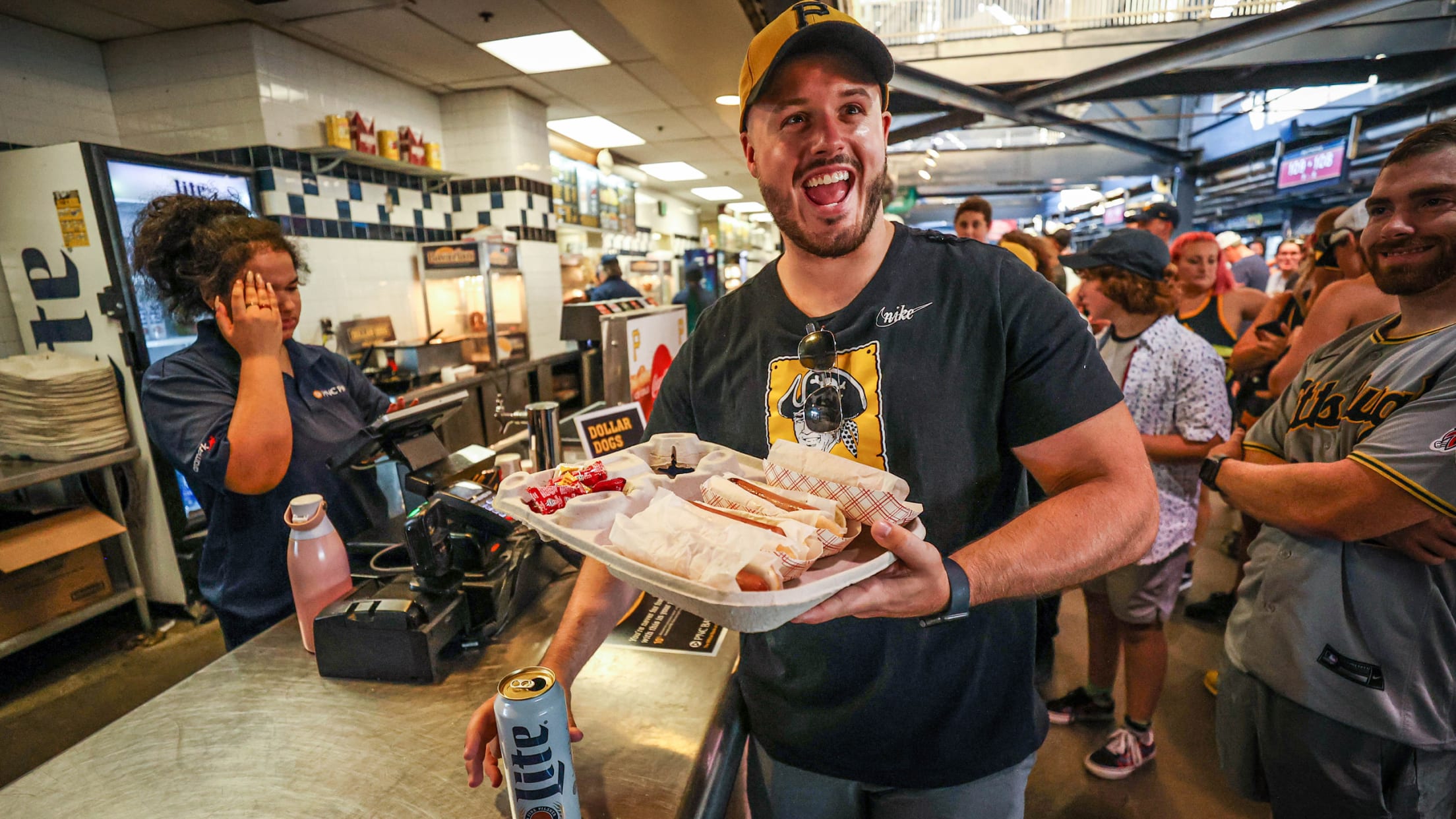 Pirates fan enjoy Sugardale hot dogs at PNC Park