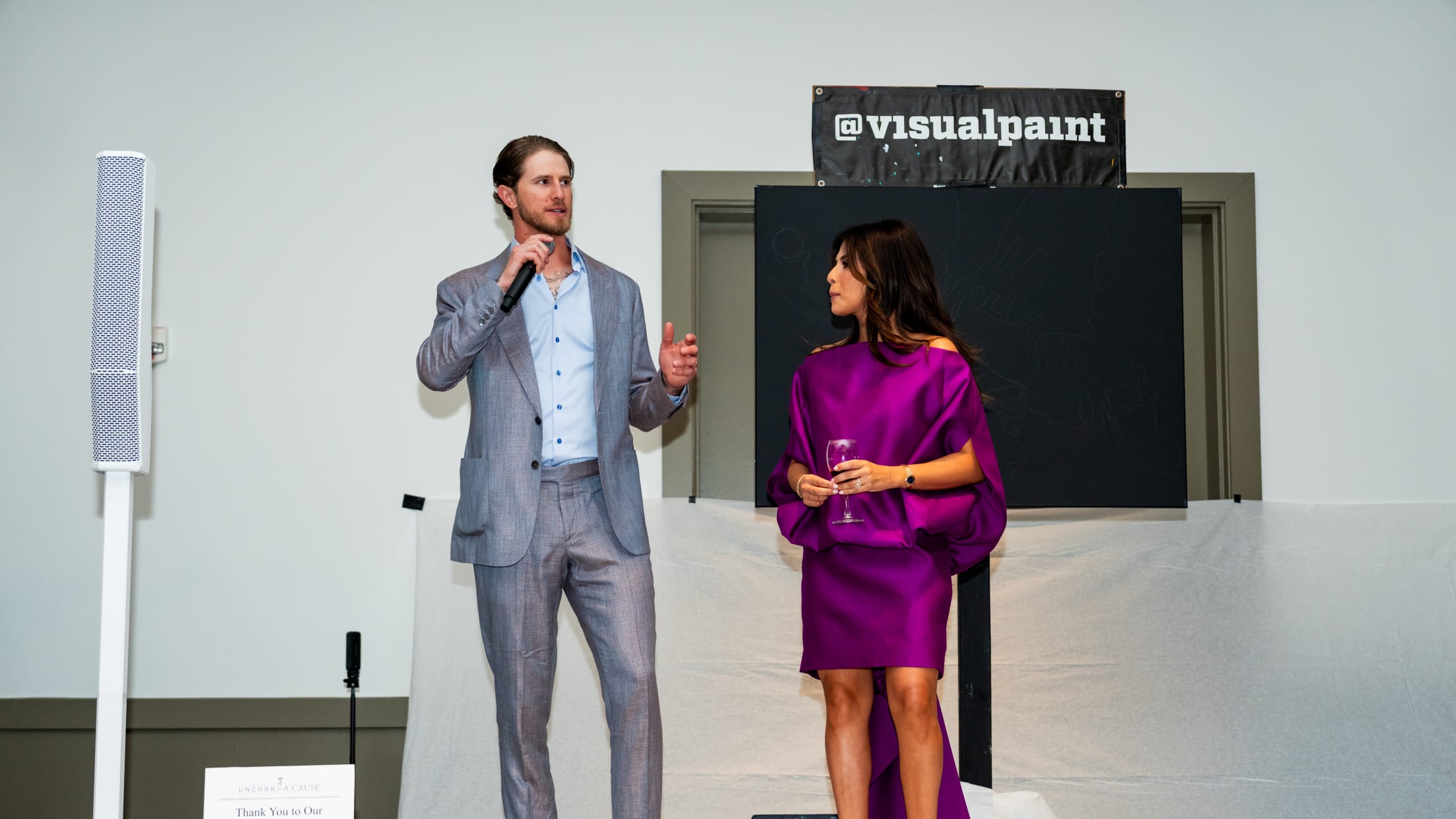 Josh Hader and wife Maria Hader speak to attendees at an Uncork for a Cause event.