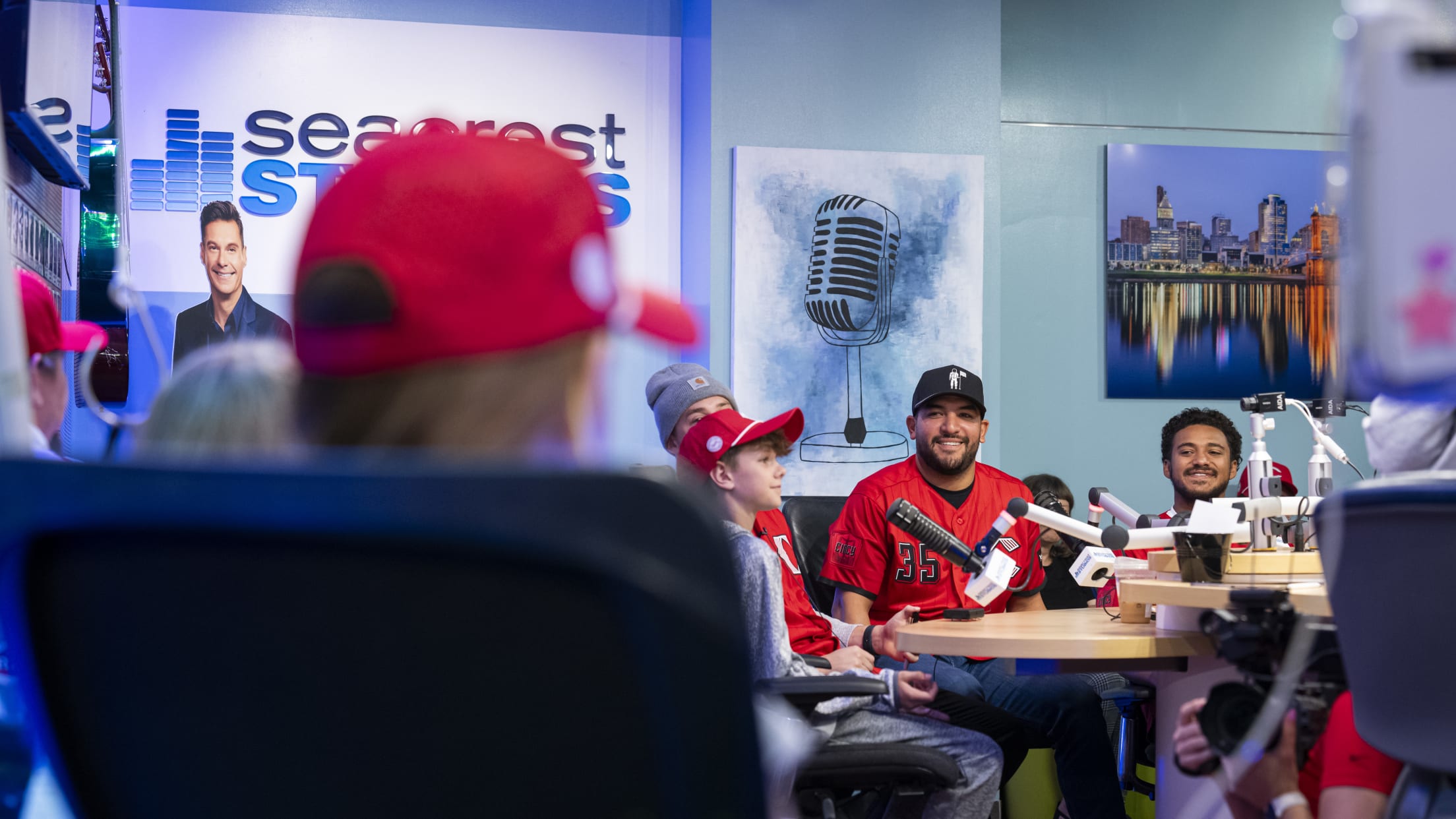 Jose Trevino joins kids on a radio show.
