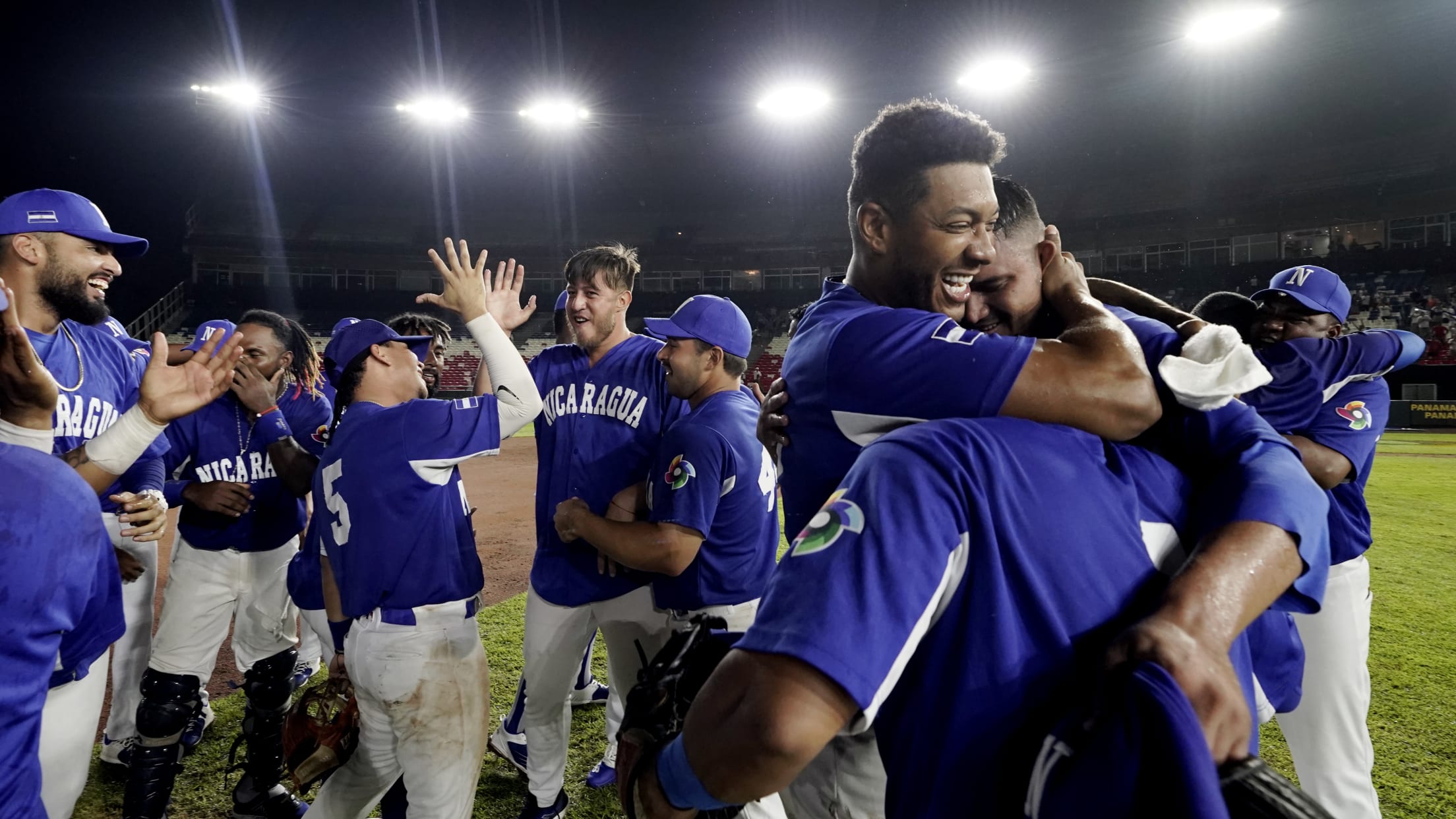 Team Nicaragua celebrates its final win over Brazil in Panama City to qualify for the 2023 World Baseball Classic.
