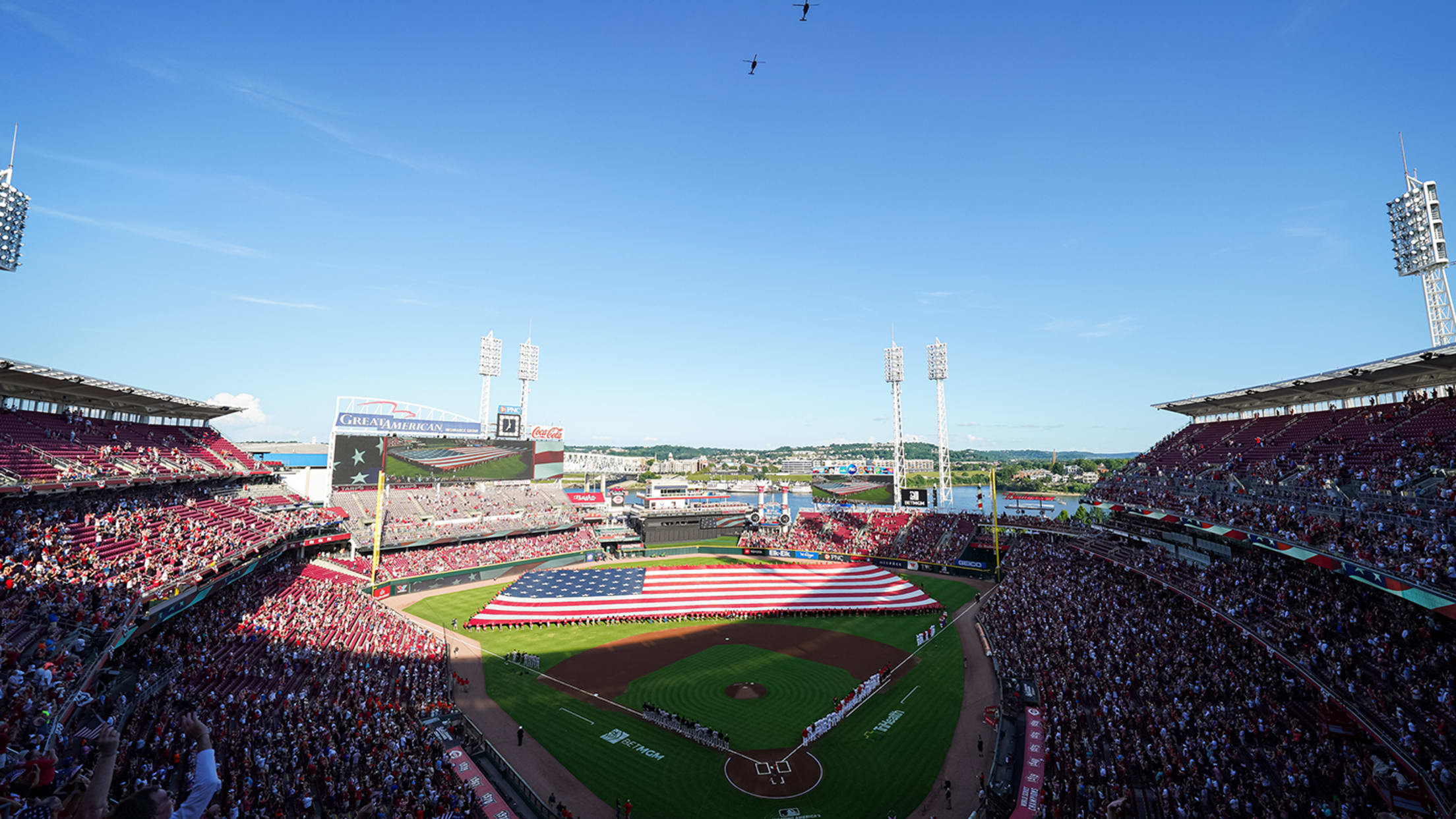 Fourth of July flyover during national anthem before Reds game in 2026.
