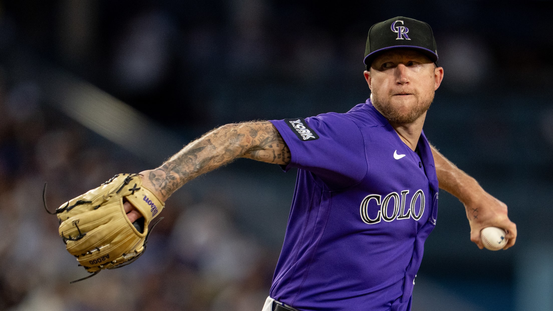 Kyle Freeland throws a pitch on the hill.