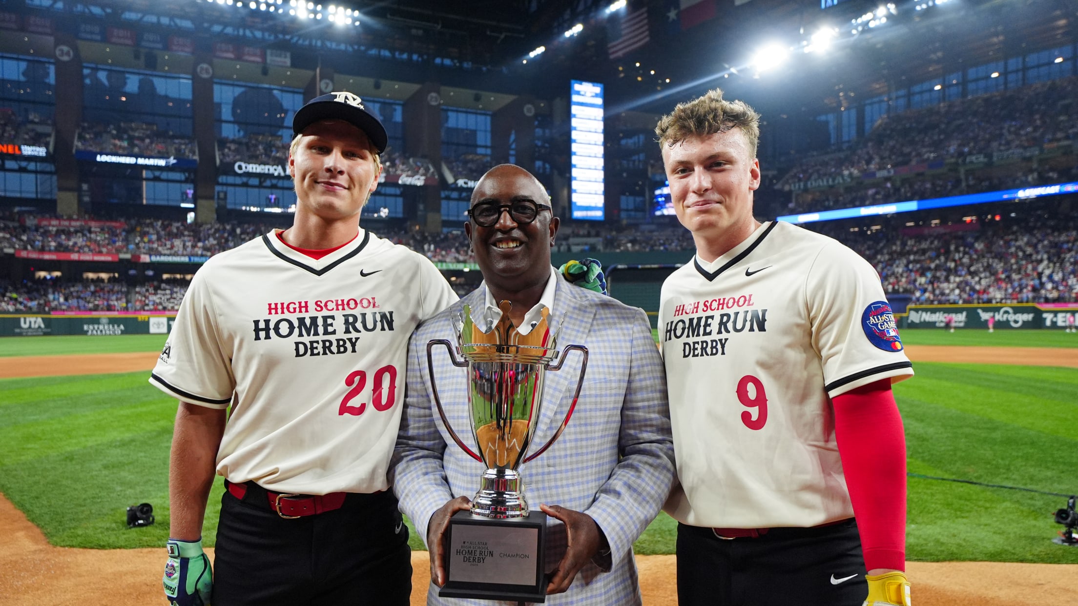 MLB Chief of Baseball Development Tony Reagins and the winners of the high school Home Run Derby.