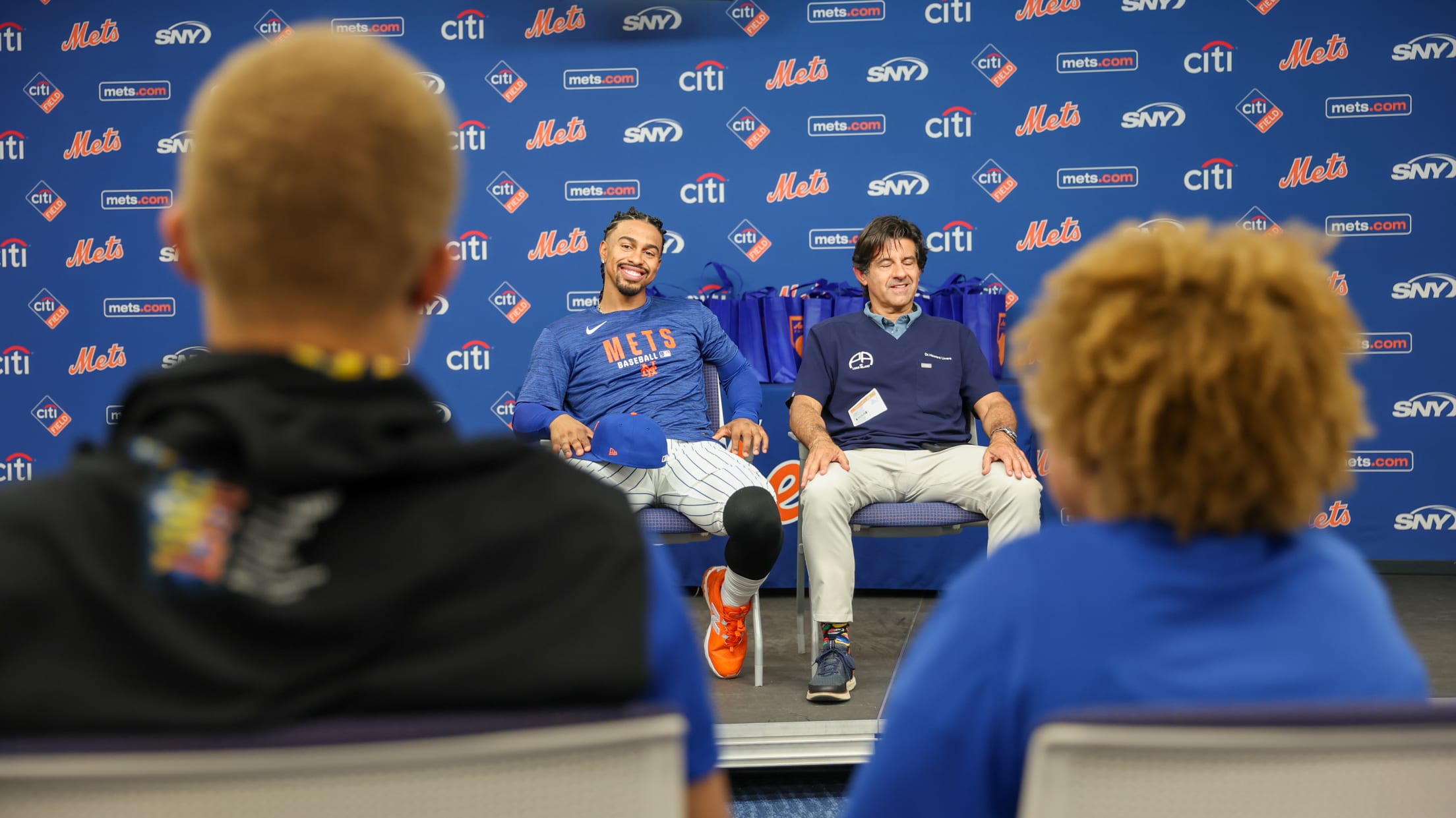 Francisco Lindor is all smiles as he speaks to kids at a Smile Tuesday event at Citi Field.