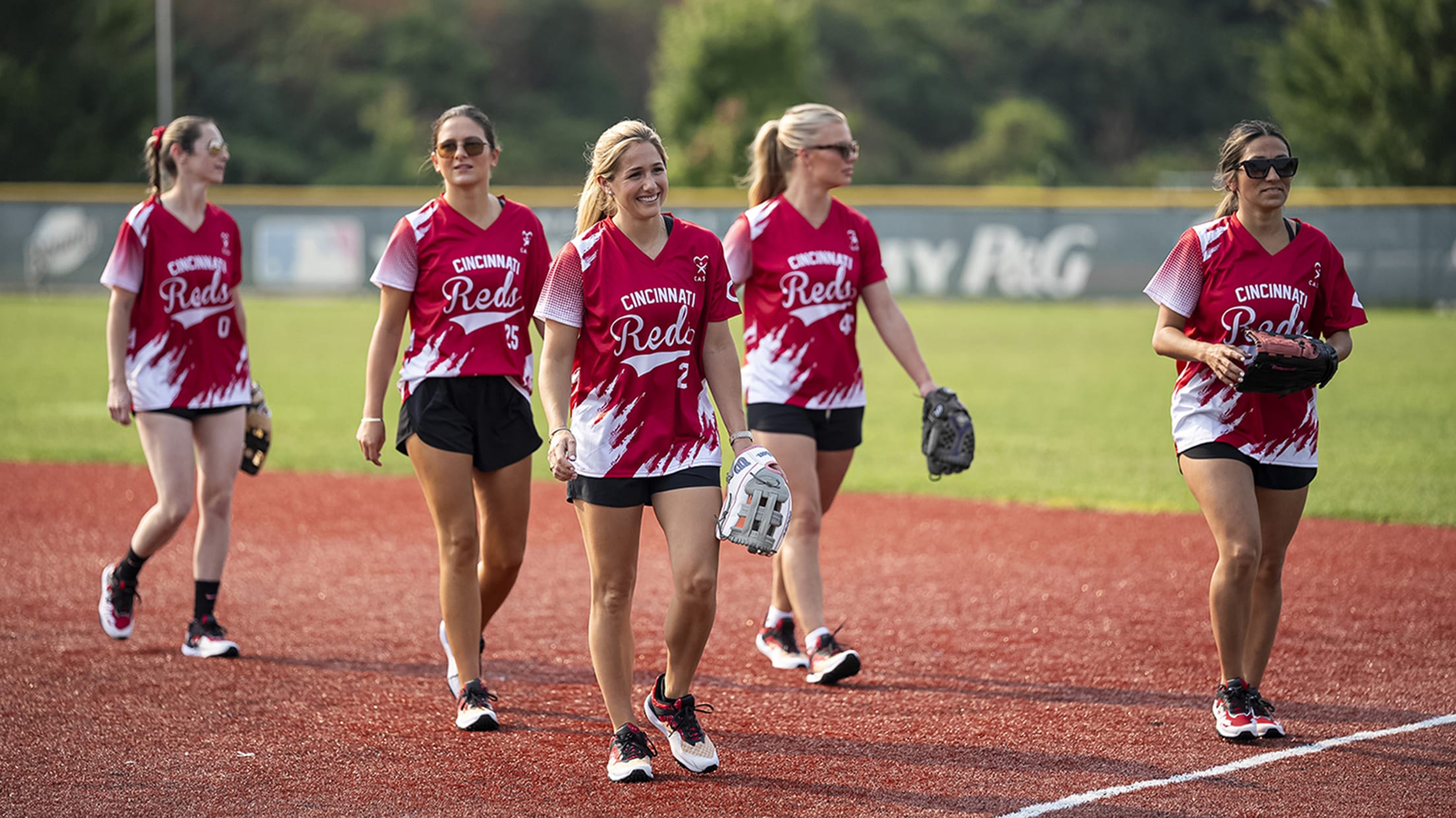 Reds wives walking off the field.