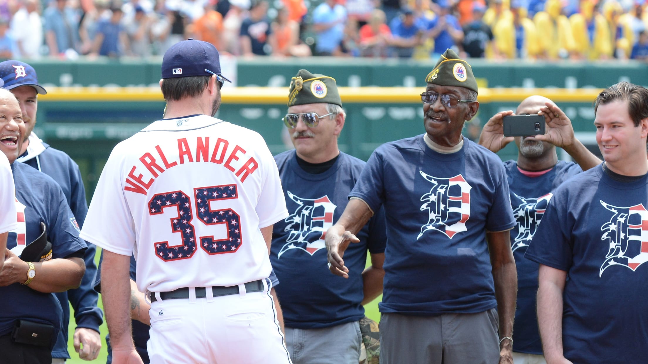 Justin Verlander shakes the hands of United States veterans, thanking them for their service.