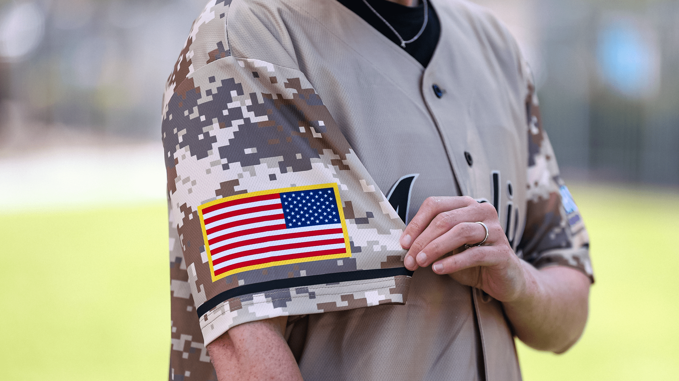 Fan wearing a Marlins Military Appreciation Night jersey