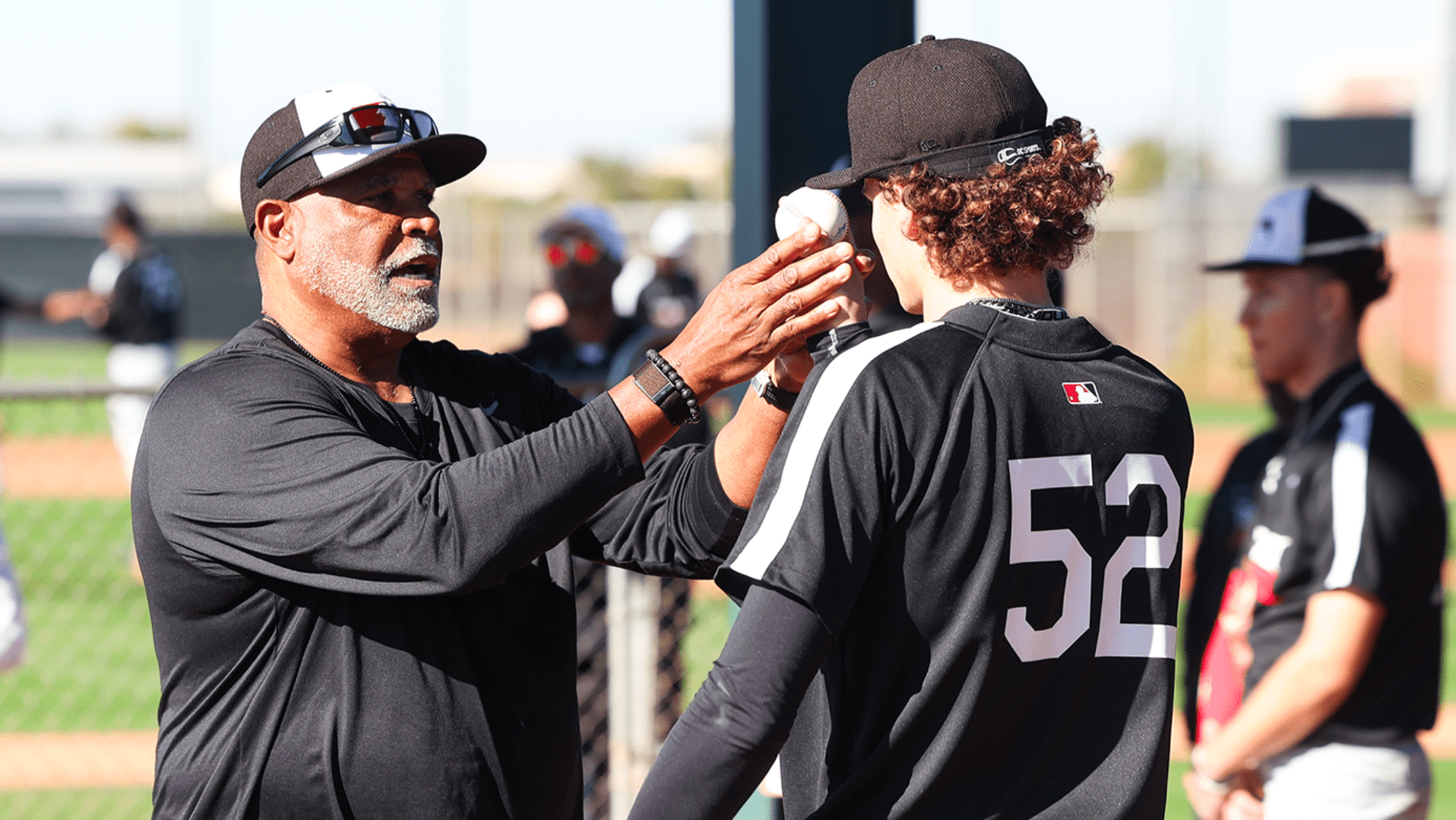 A player receives instruction from a coach at the Dream Series.