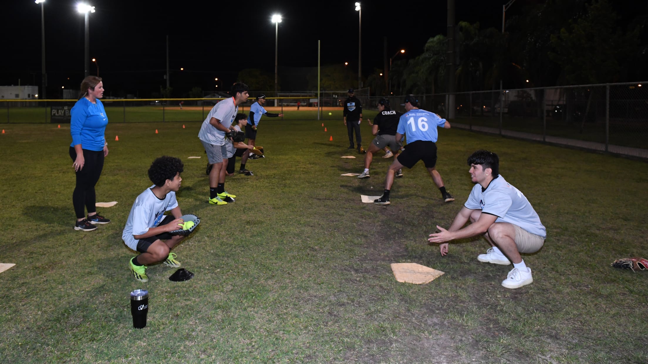 Players practice their catching skills at the Nike RBI Winter Development Clinic.