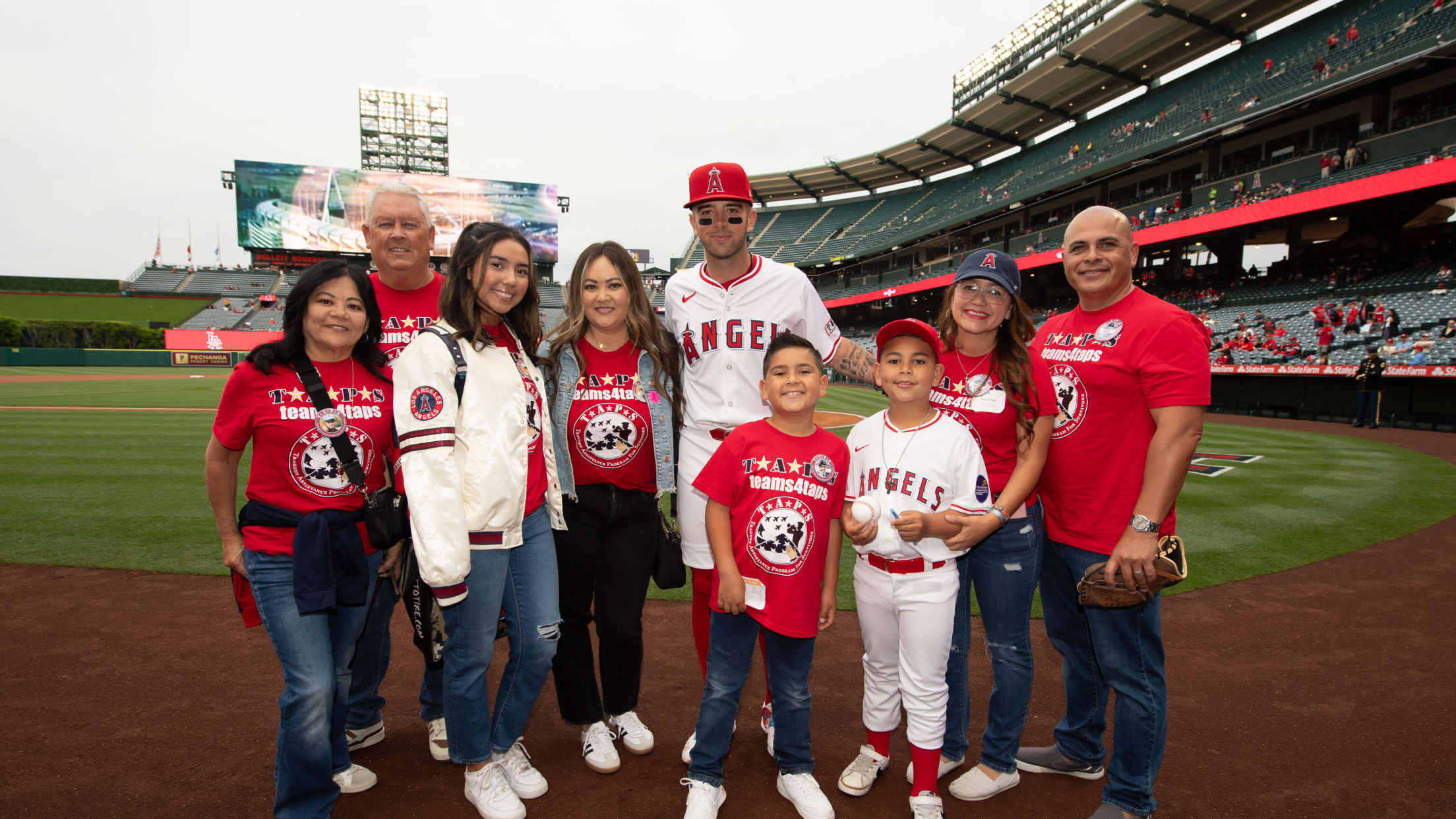 Zach Neto poses for a photo with Los Angeles Angels fans.