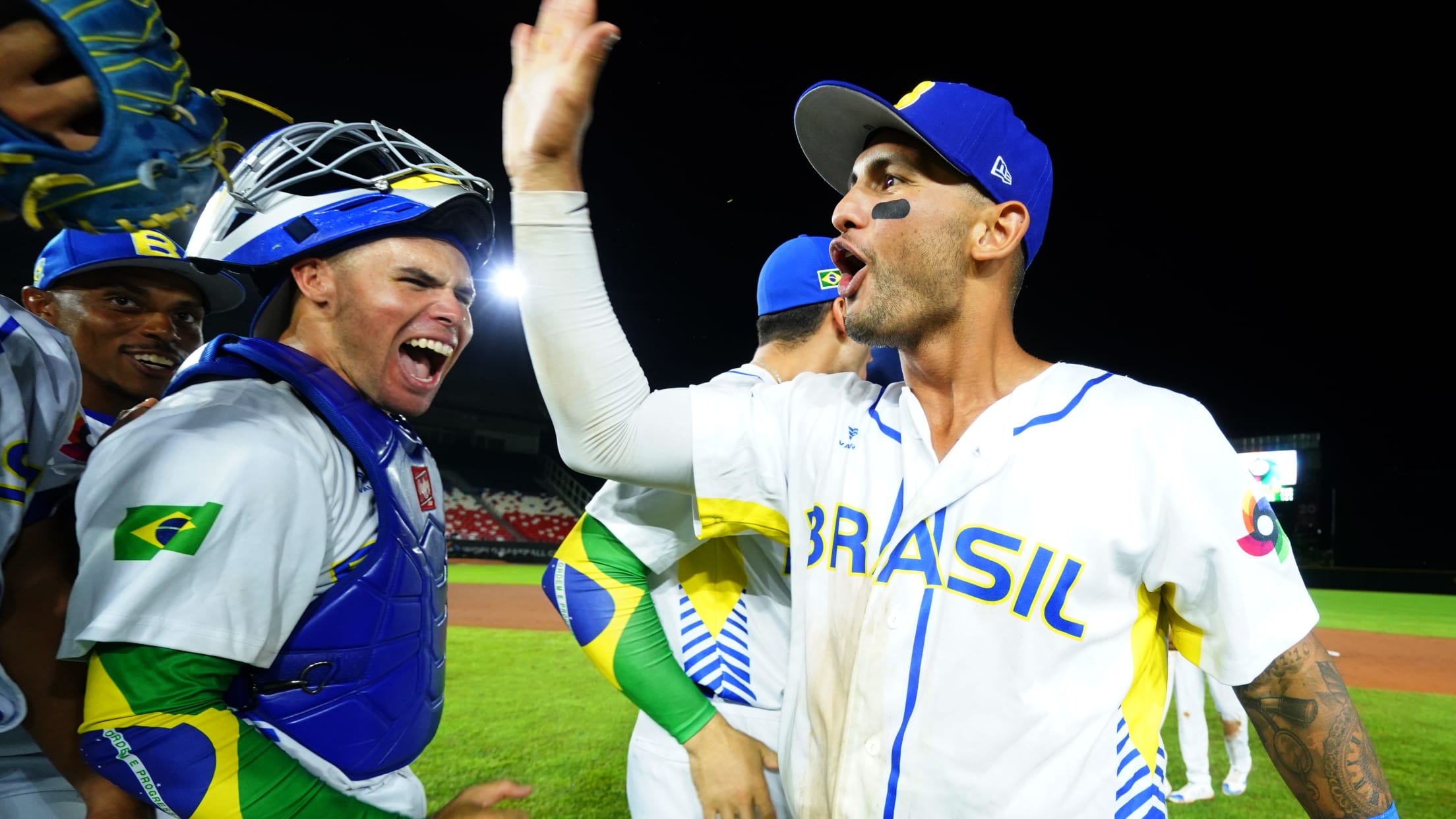 Tim Lopes celebrates with Team Brazil during a win in the 2022 World Baseball Classic qualifiers in Panama City.