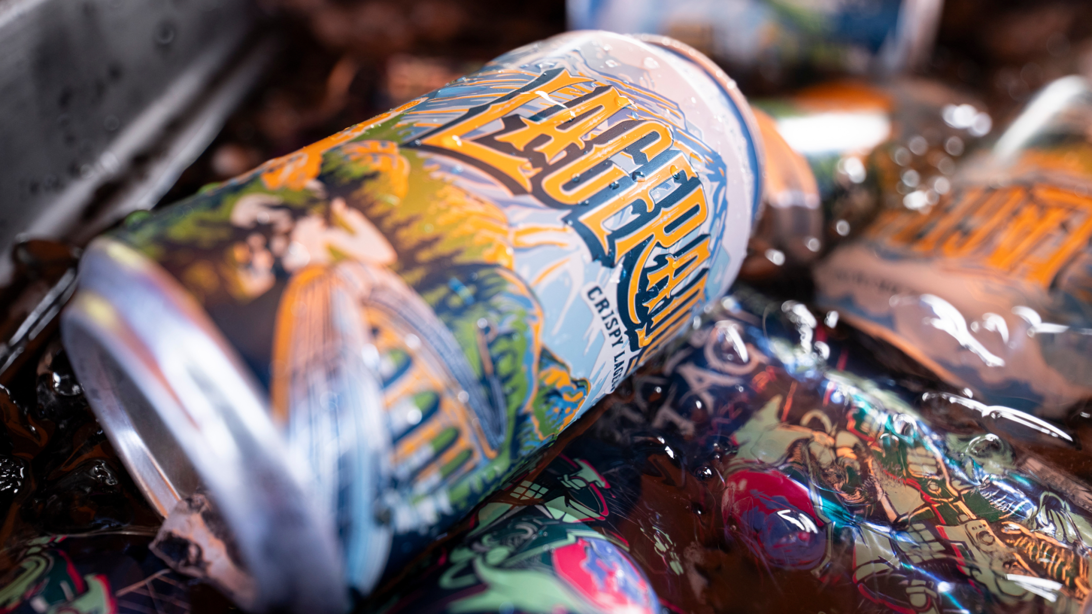 Close up of Lagerado can of lager beer in an ice bucket with mountains on the can