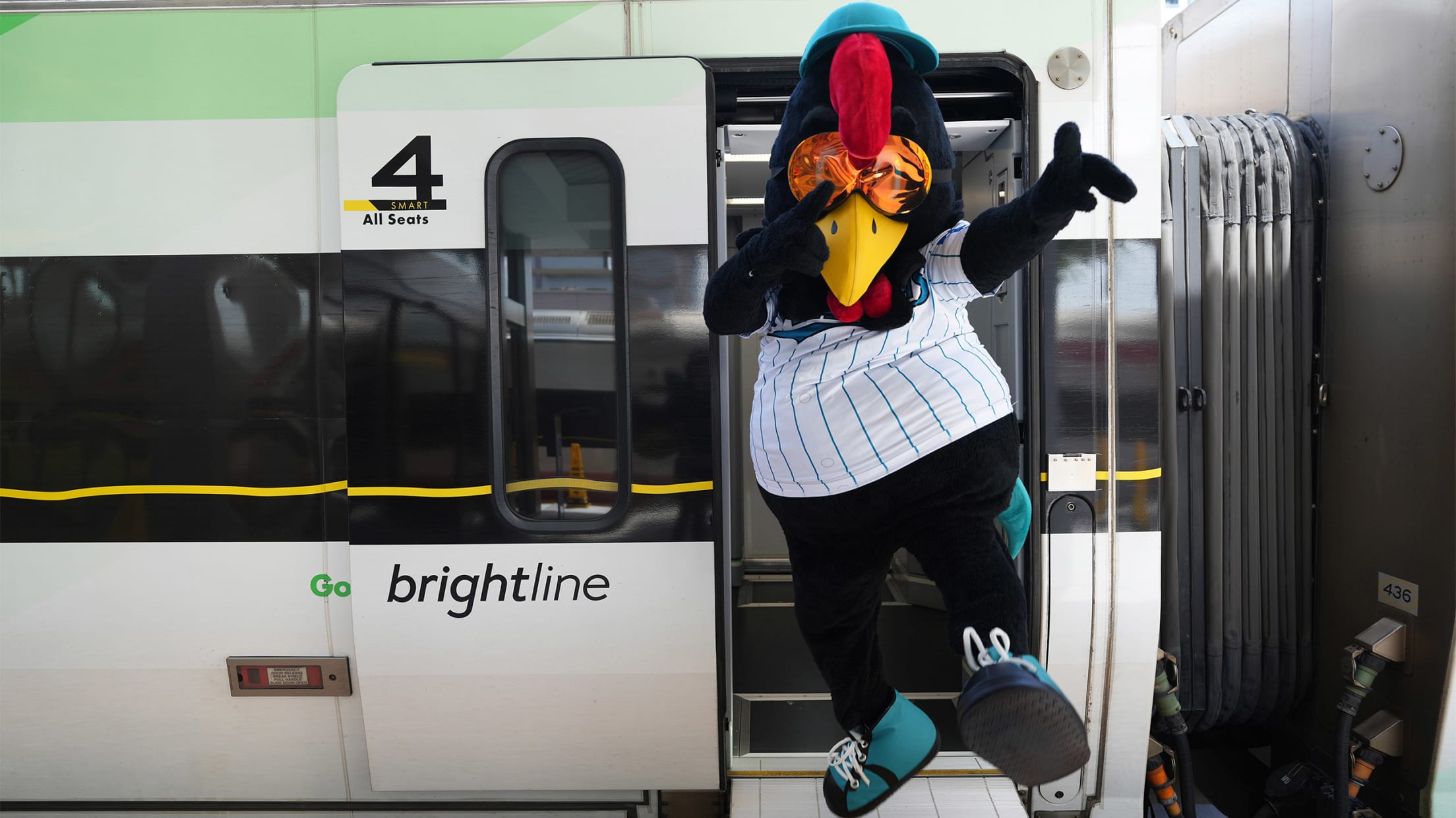 Billy the Marlin rides Brightline