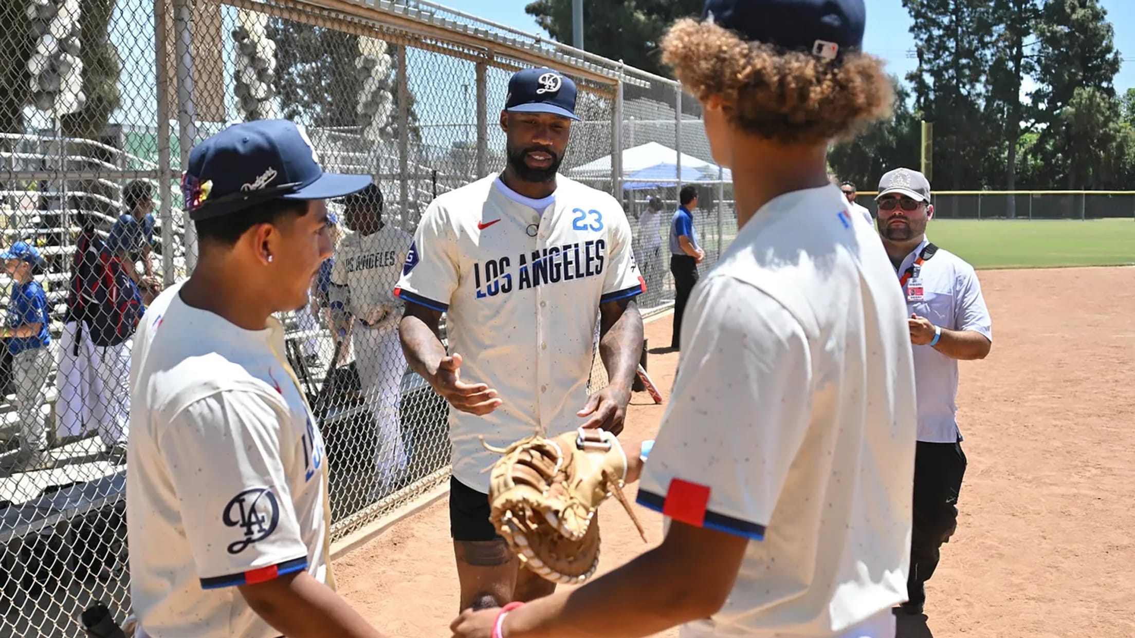 LADF’s Dodger Dreamteam, joined by players and legends, are first to take the field in Nike City Connect uniforms