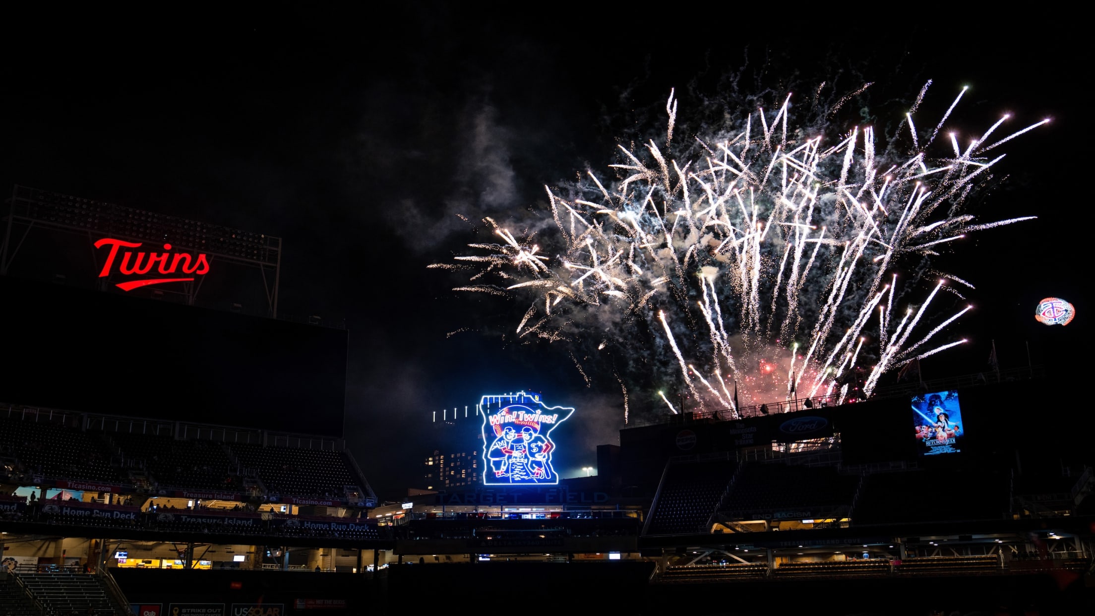 Fireworks exploding during postgame fireworks show at Target Field