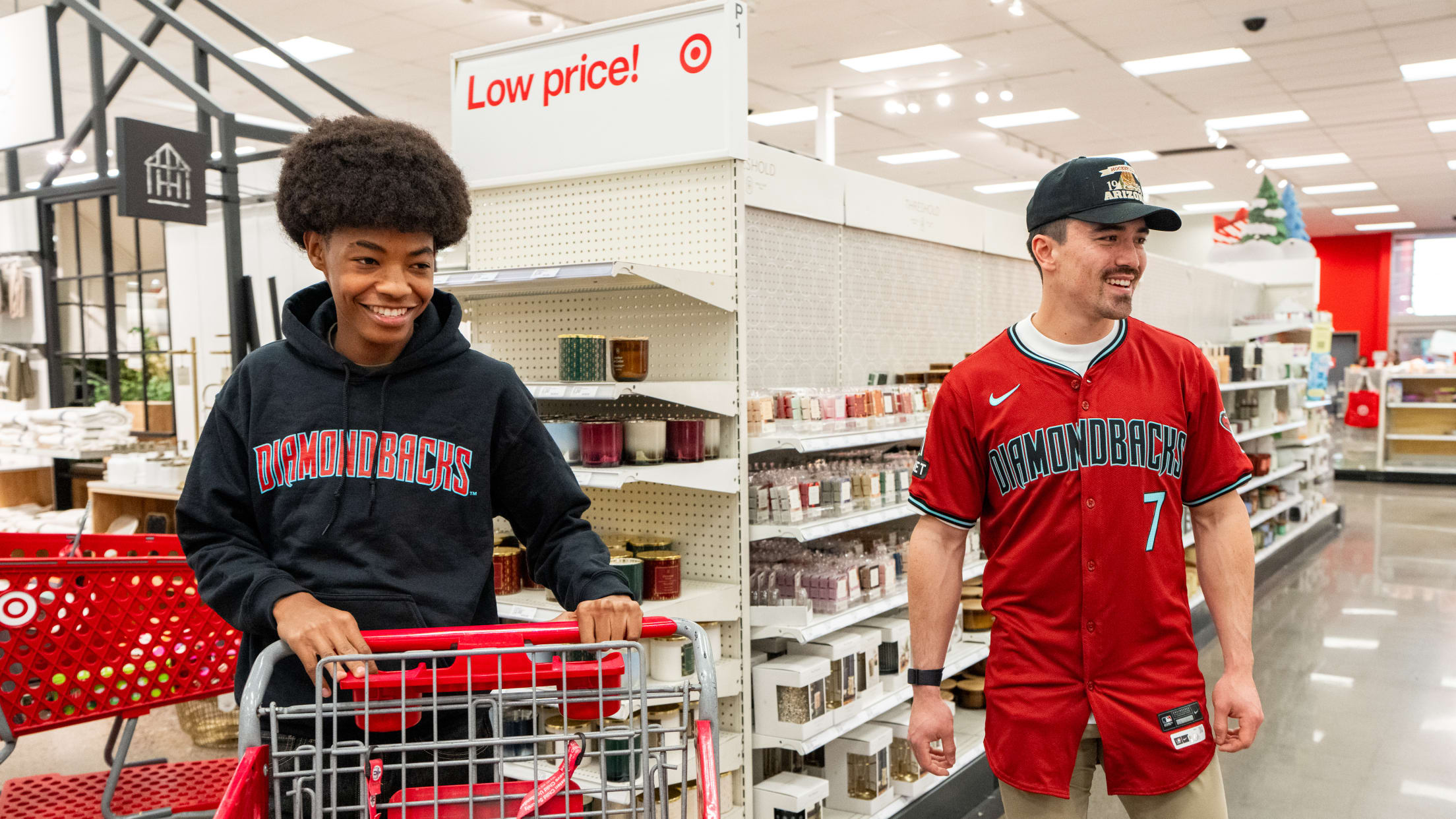 Corbin Carroll walks around Target with a fan as the Diamondbacks partner with A New Leaf to gift 40 teenagers a $250 shopping spree.