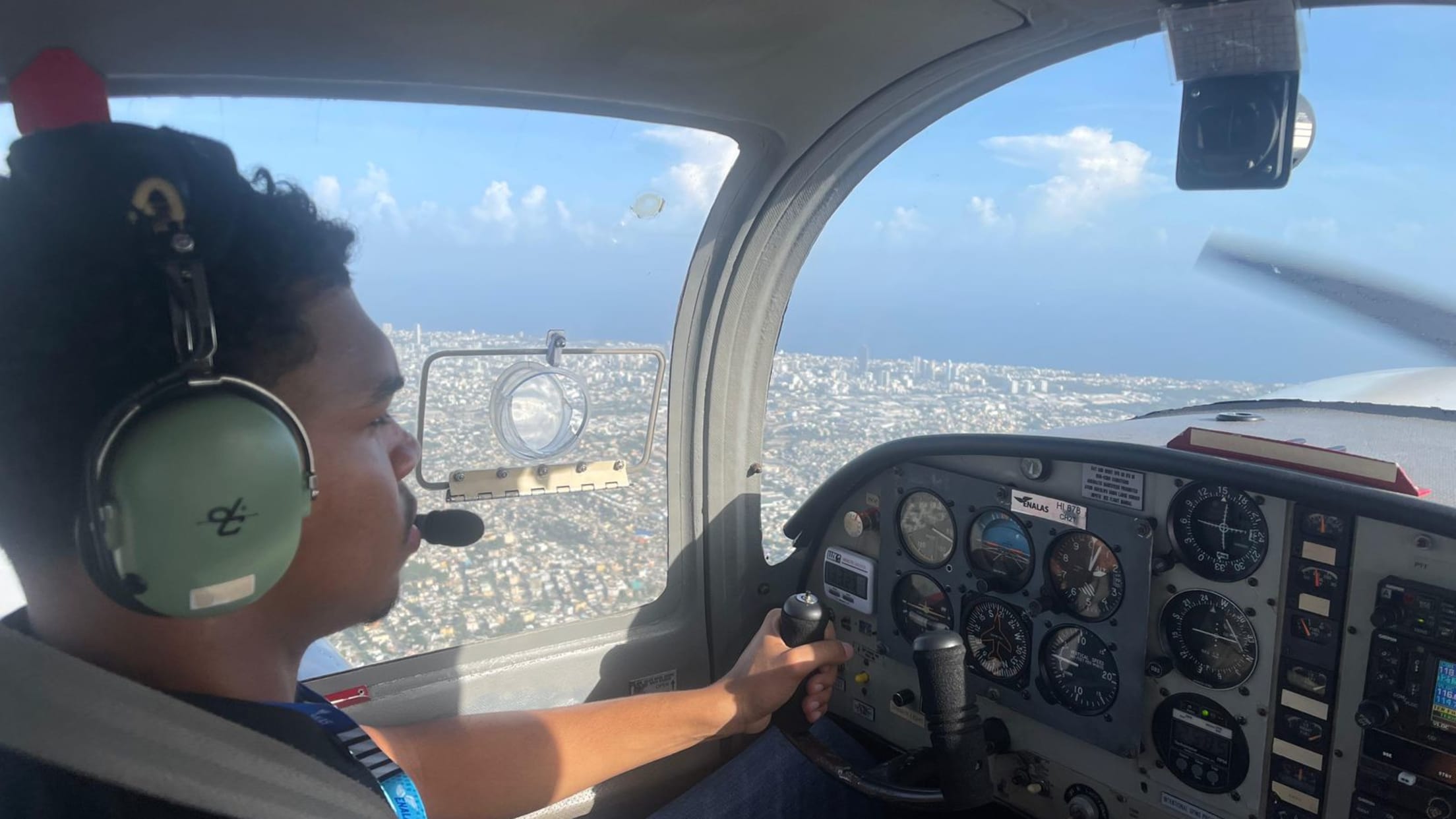 Jeremy Castro piloting a plane.