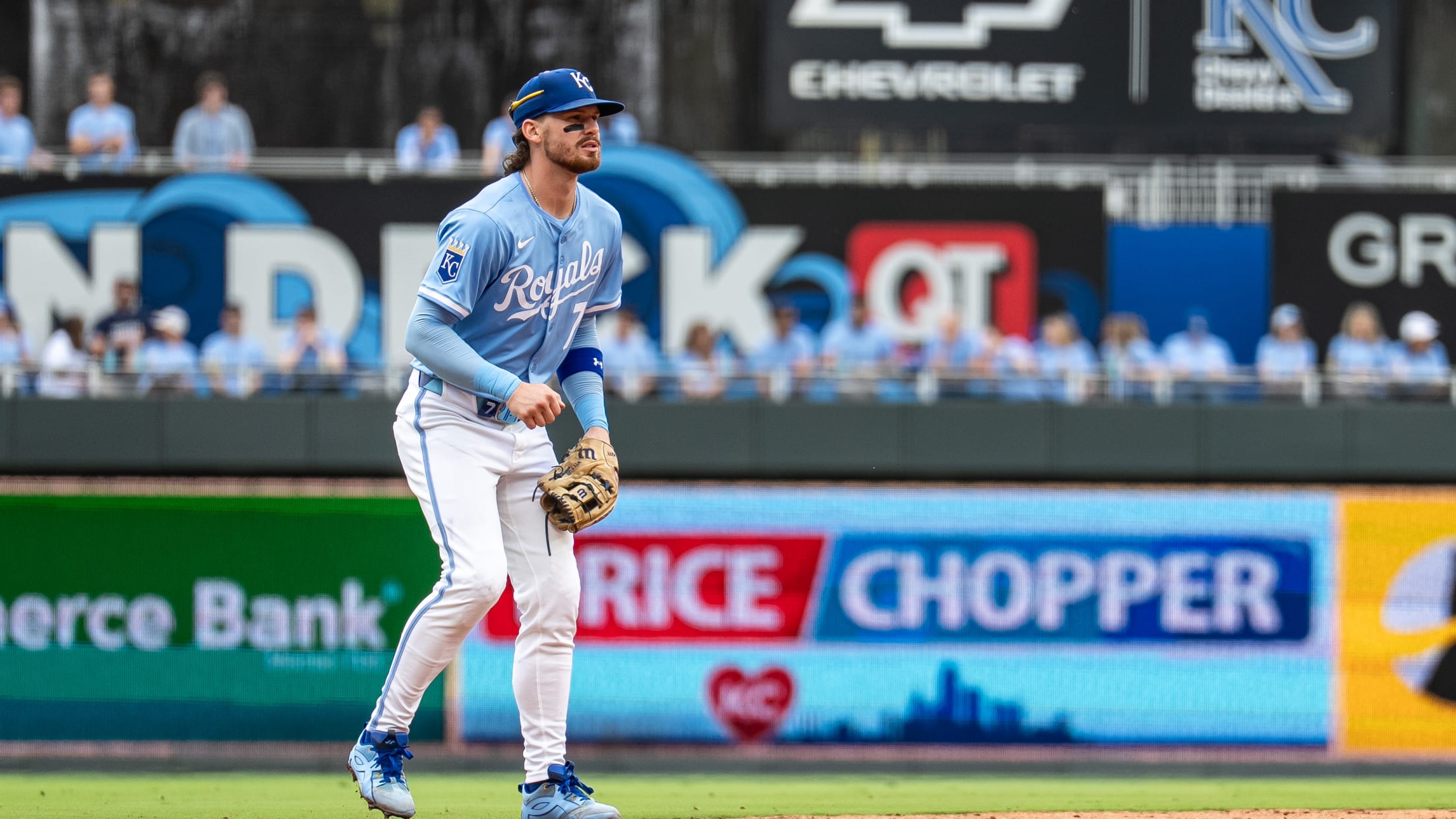 Bobby Witt Jr. positions himself in the infield during a game against the Seattle Mariners.