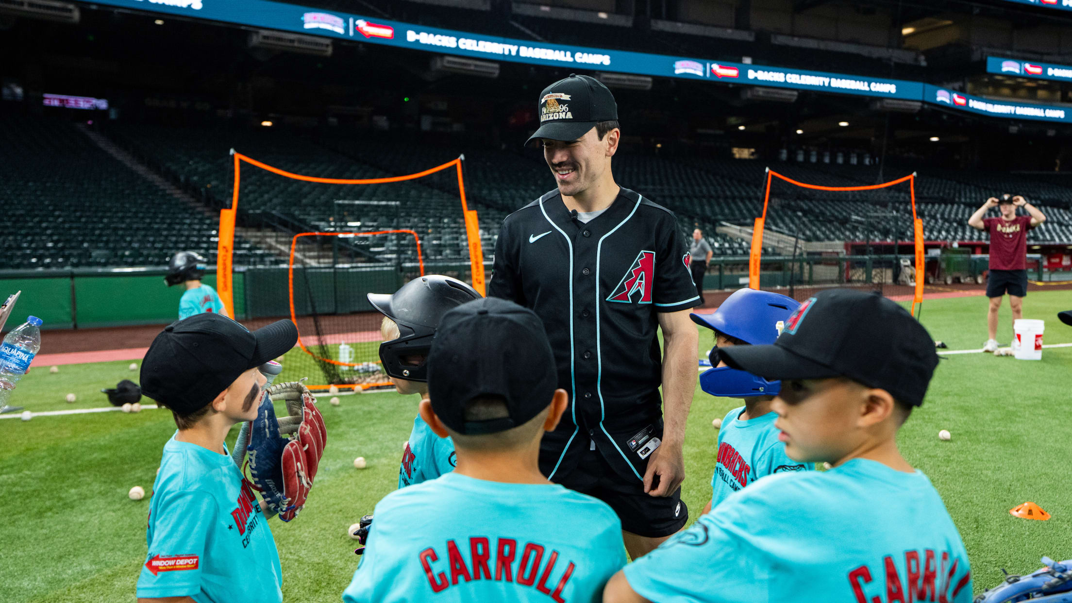 Corbin Carroll meets with young fans at the Diamondbacks Celebrity Baseball Camps at Chase Field.