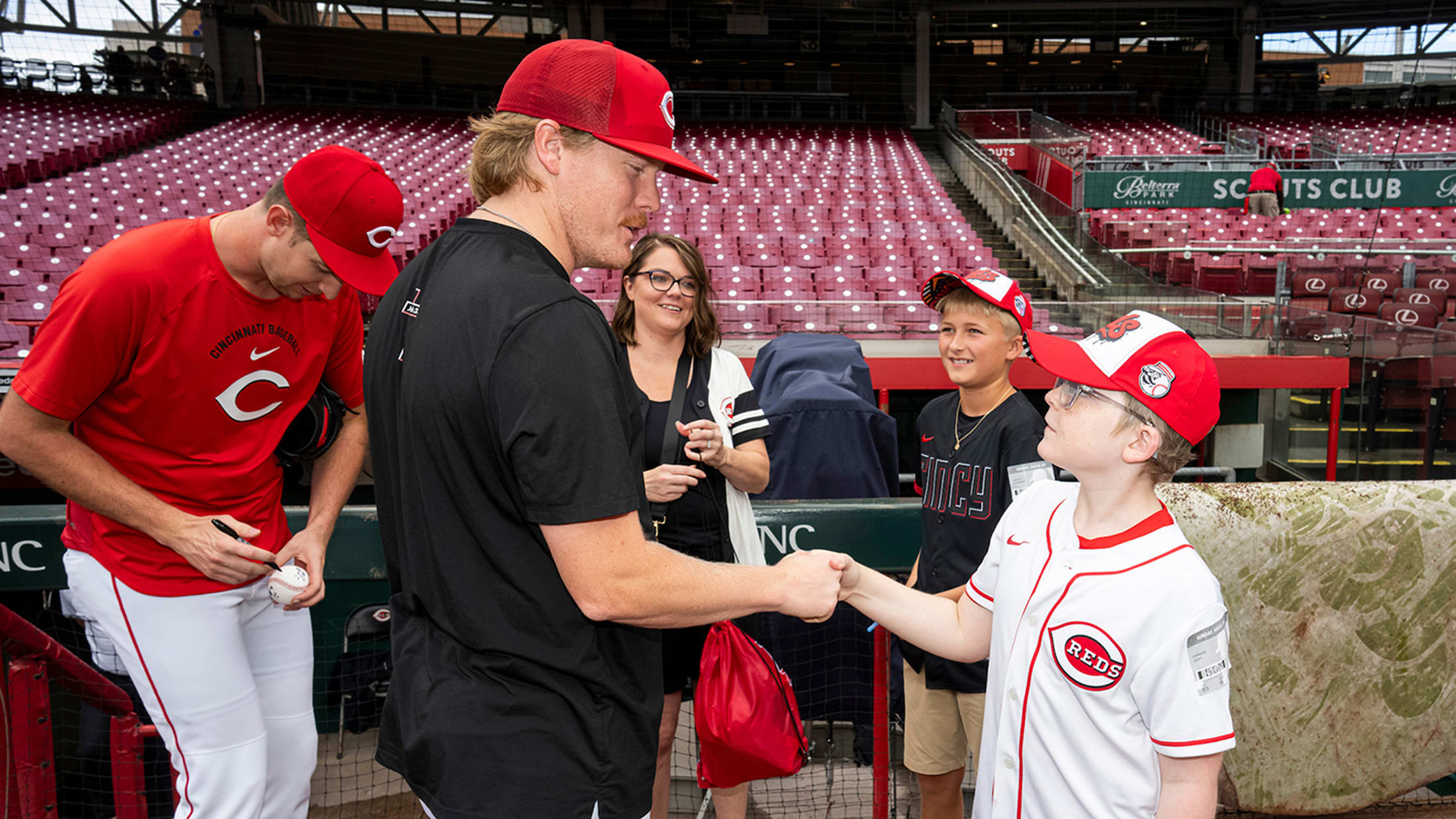 Andrew Abbott shakes hands with Connor Hyitt.